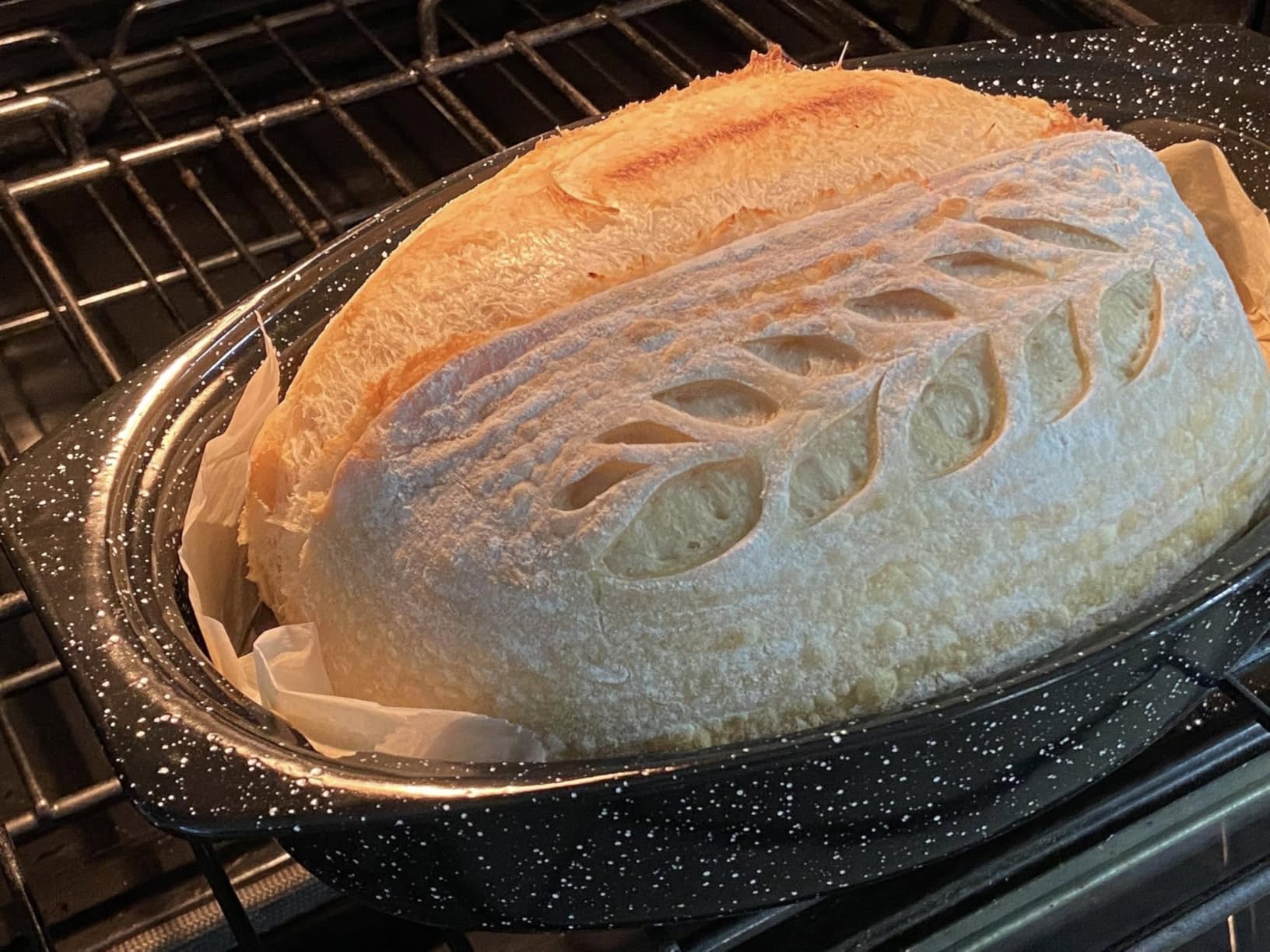 Granite Ware 13-inch oval roaster with Lid. Enameled steel design to accommodate up to 7 lb poultry/roast. Resists up to 932°F. customer photo 1