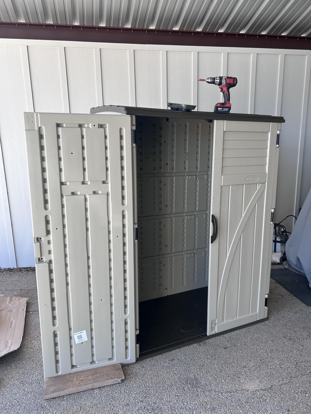 Suncast Outdoor Storage Shed, Water Resistant Resin Vertical Outdoor Storage Cabinet for Patio, Garden Tools, Cushions, & Equipment, Weatherproof Multi-Wall Design, 54 cu. ft., Made in USA customer photo 1