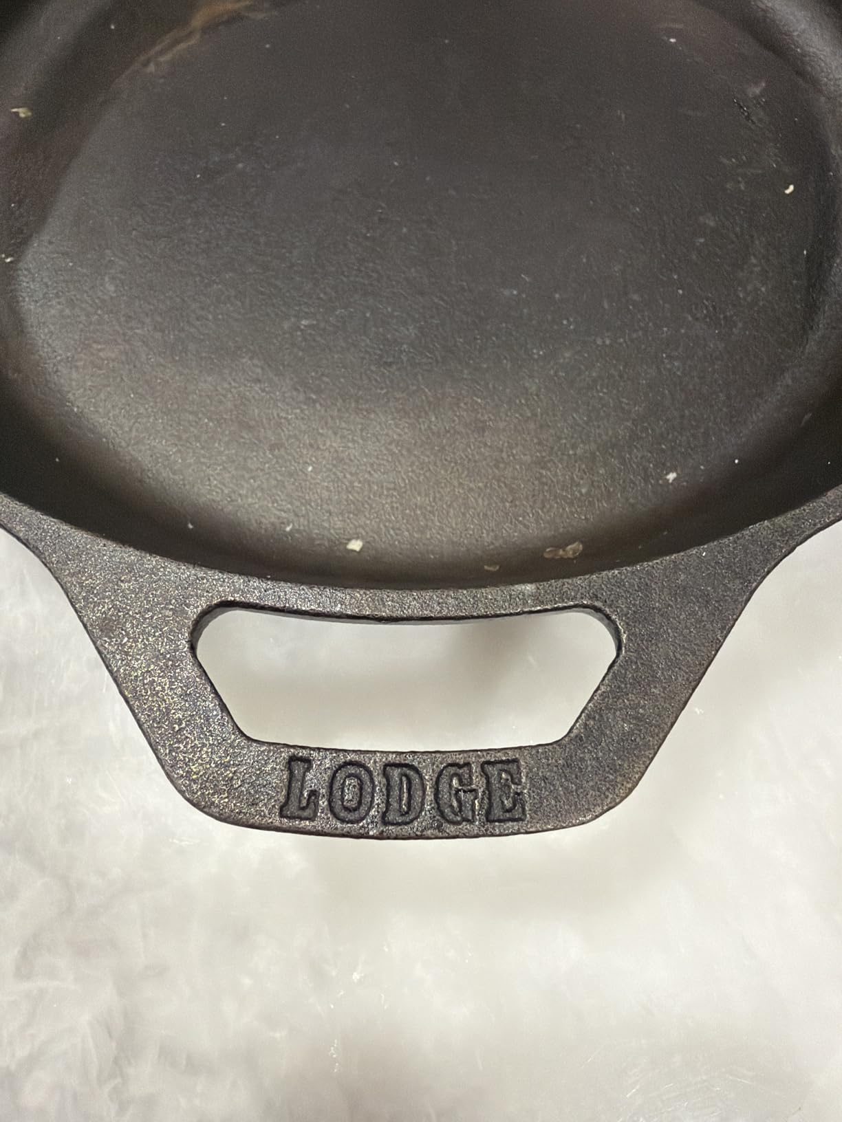 Lodge Seasoned Cast Iron Skillet - Quality Frying Pan for the Stove, Oven, Grill & Campfire - Includes Silicone Hot Handle Holder - Non-Toxic, Nonstick & Long-Lasting - 12 Inches customer photo 1