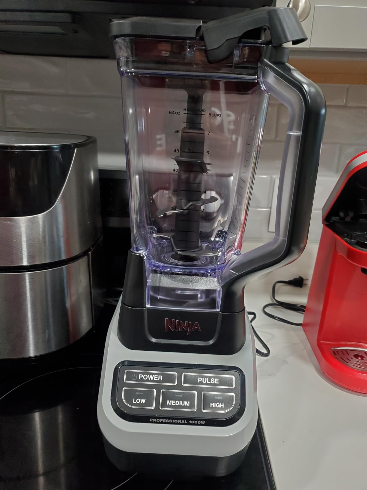 Ninja Professional Blender | Smoothie Blending, Drink Mixer, Grinder, Ice Crusher, Frozen Fruit Blending | 1000W Power, Total Crushing Technology, XL 72-oz. Pitcher | Black & Grey | BL610 customer photo 2