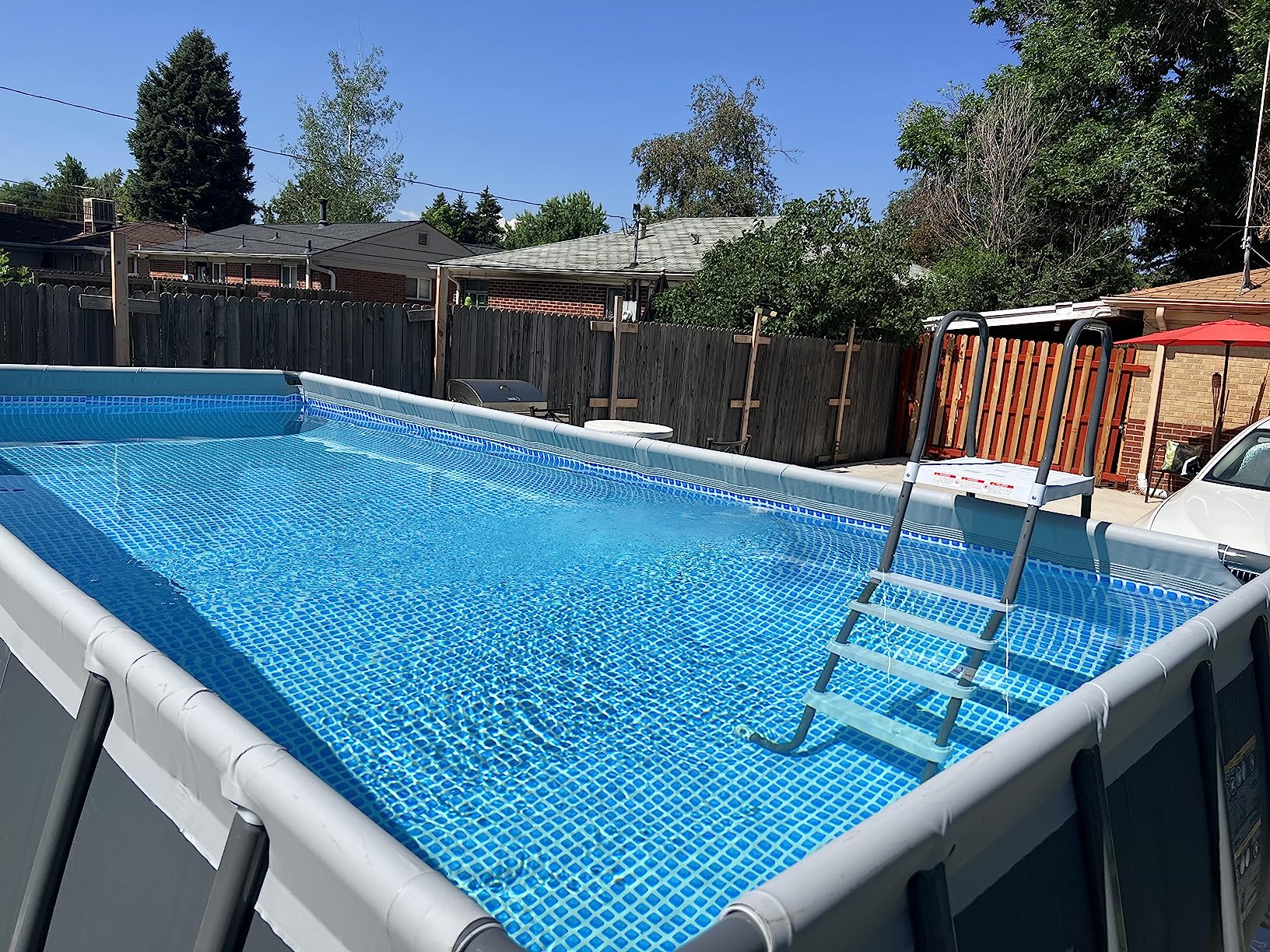 INTEX Ultra XTR 24 ft x 12 ft 52 in Above Ground Pool Set, Rectangular Swimming Pool with Steel Frame, 2100 GPH Sand Filter Pump, Ladder, Cover, & Ground Cloth customer photo 1
