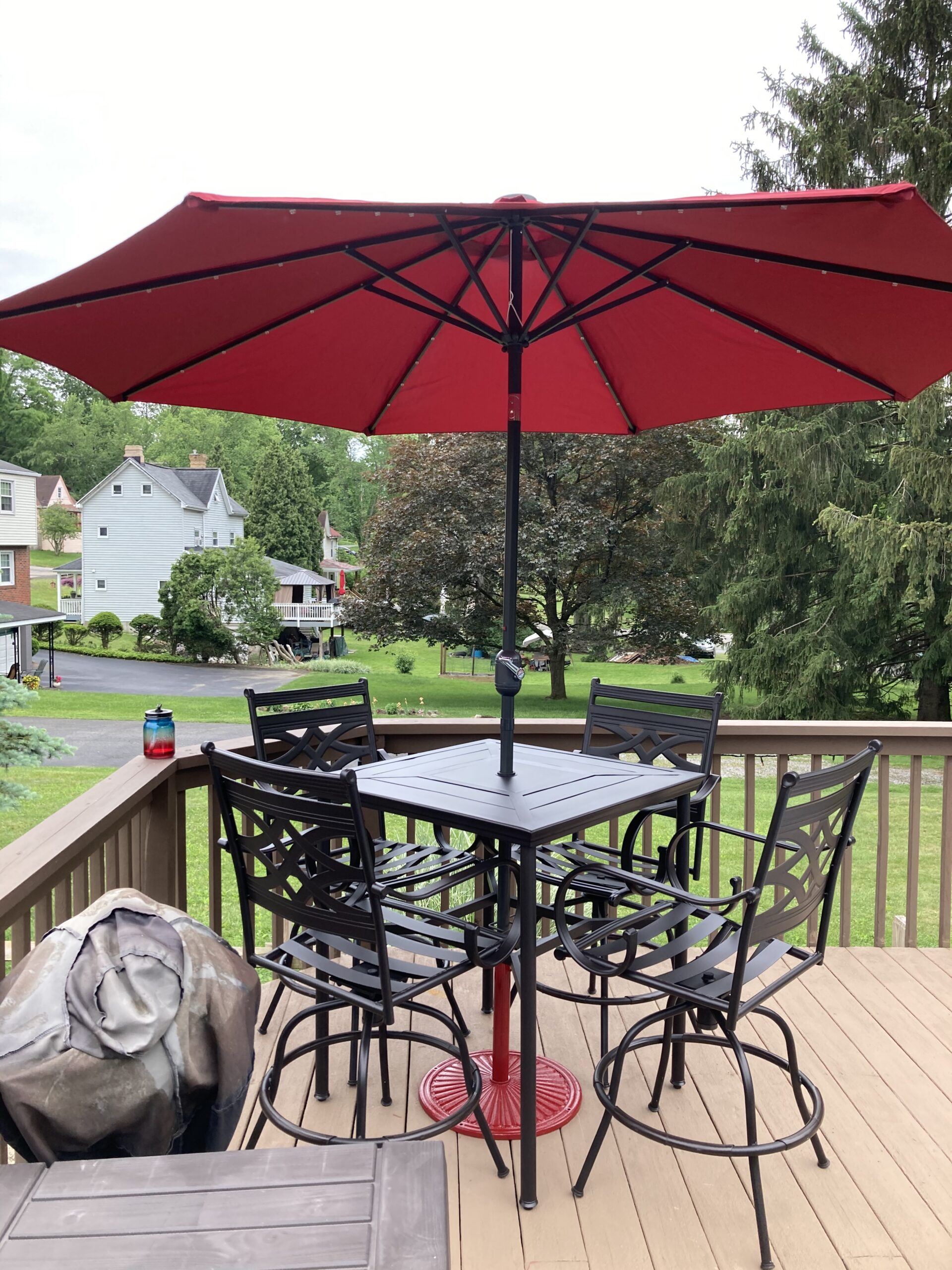 Hanover Montclair 11-Piece Patio Dining Set with 10 Swivel Rocker Chairs, Accent Lumbar Pillows and 84