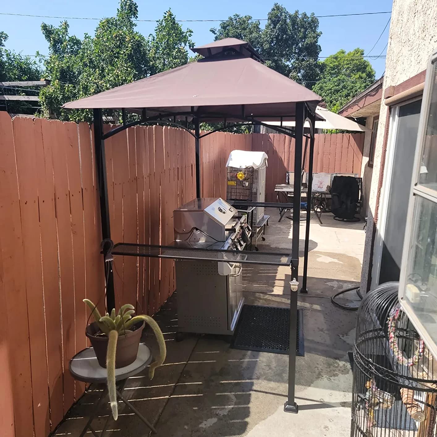 Eurmax USA 5x8 Grill Gazebo Shelter for Patio and Outdoor Backyard BBQ's, Double Tier Soft Top Canopy and Steel Frame with Bar Counters, Bonus LED Light X2(Khaki) customer photo 1