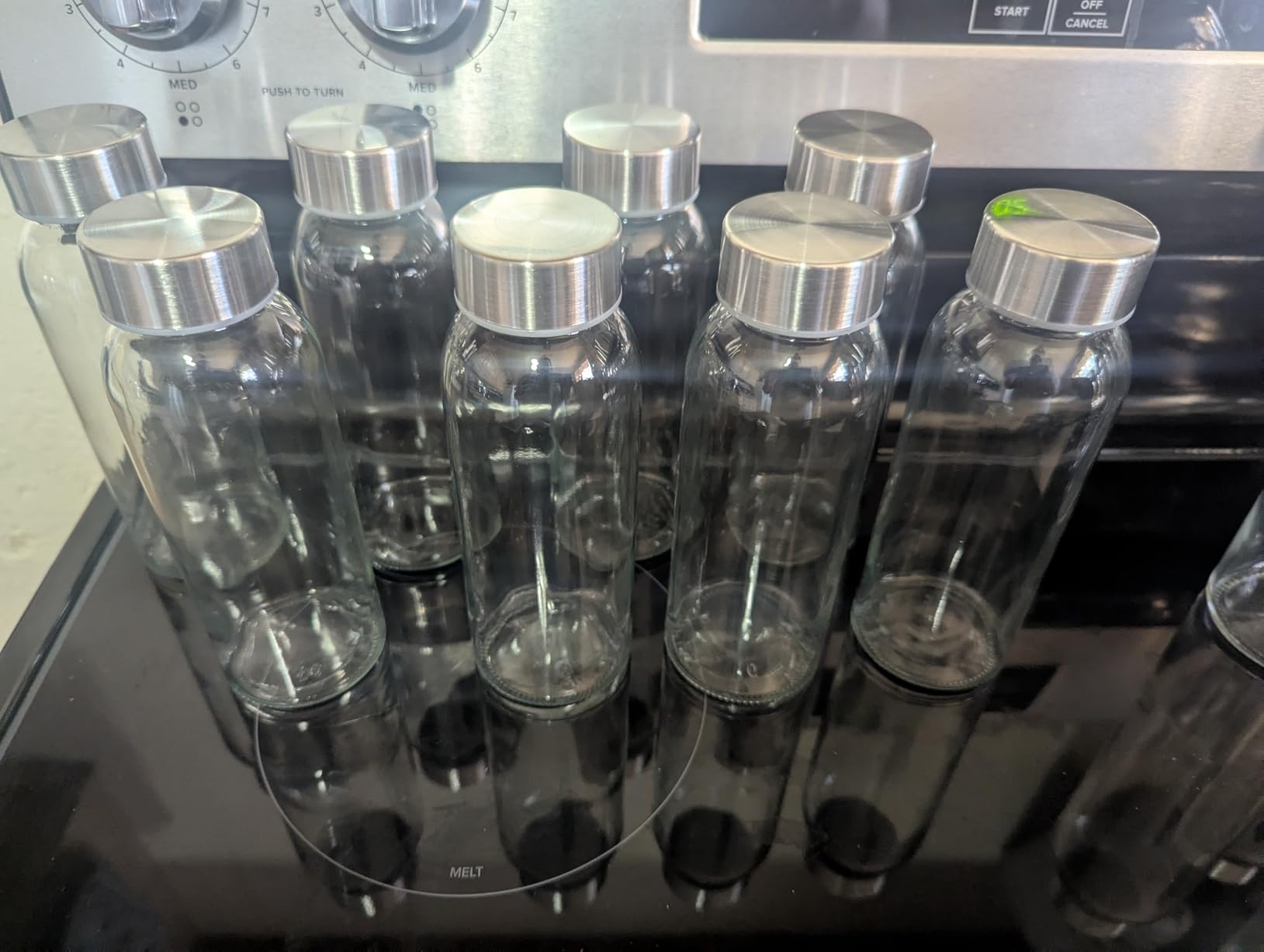 Zukro Glass Water Bottles with Lids 10.5 oz, 8 Pack Clear Reusable Glass Small Juice Bottles With Stainless Steel Cap for Juicing, Milk, Ginger Shot, BPA-Free Leak Proof 300ml Drinking Container Jar customer photo 1