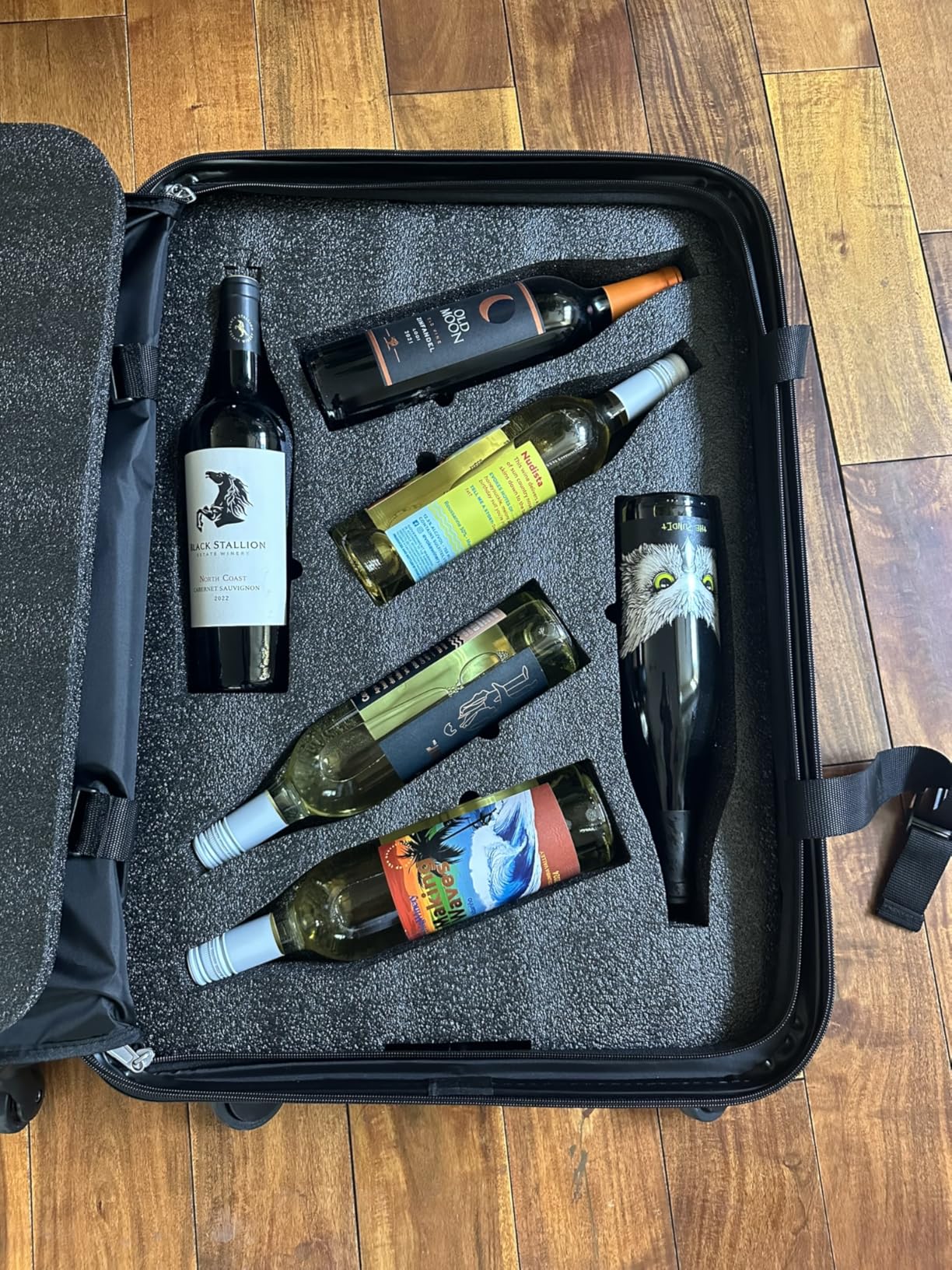 FlyWithWine® by VinGardeValise 12 Bottle Hard Shell Wine Suitcase with Hinomoto 360 Degree Spinner Wheels for Airplanes, TSA Approved Wine Luggage with Removable Foam Insert customer photo 2