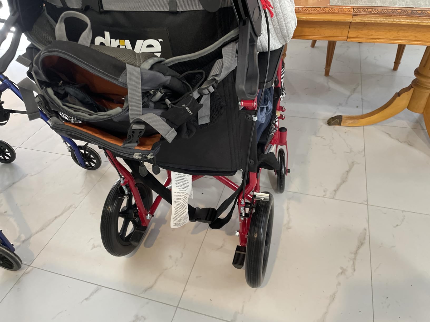 Drive Medical Lightweight Expedition Folding Transport Wheelchair - Ultra Lightweight Mobility Support for Seniors & Adults - Strong Aluminum Frame - Hand Brakes - Compact Folding Travel Chair - Red customer photo 1