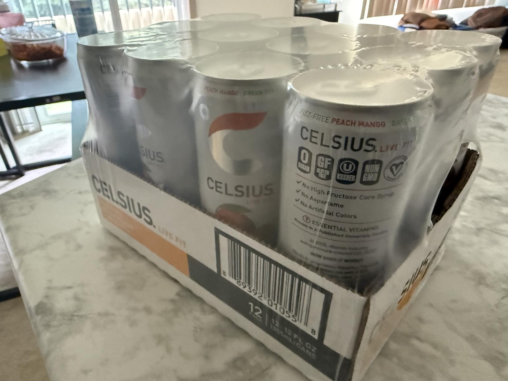 CELSIUS Fizz Free Peach Mango Green Tea, Sugar Free Energy Drink, 12 Fl Oz (Pack of 12) customer photo 1