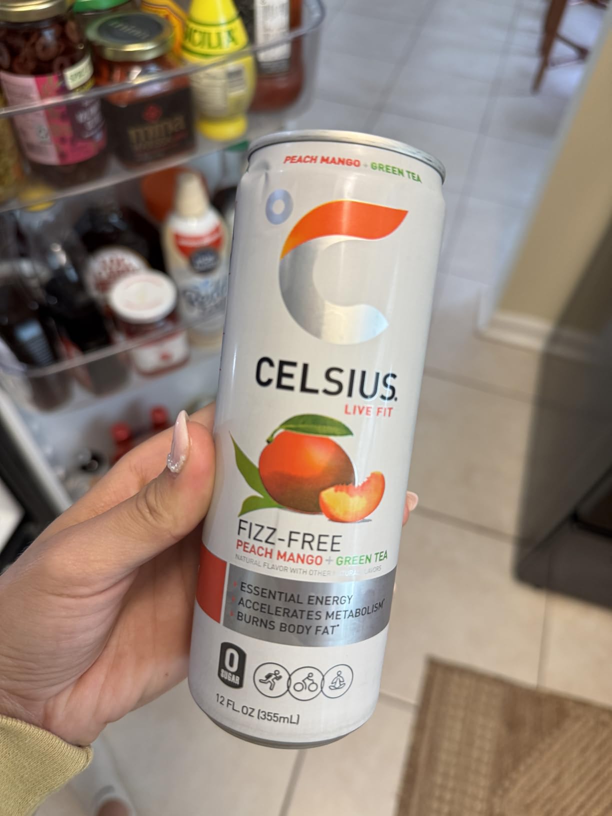 CELSIUS Fizz Free Peach Mango Green Tea, Sugar Free Energy Drink, 12 Fl Oz (Pack of 12) customer photo 2