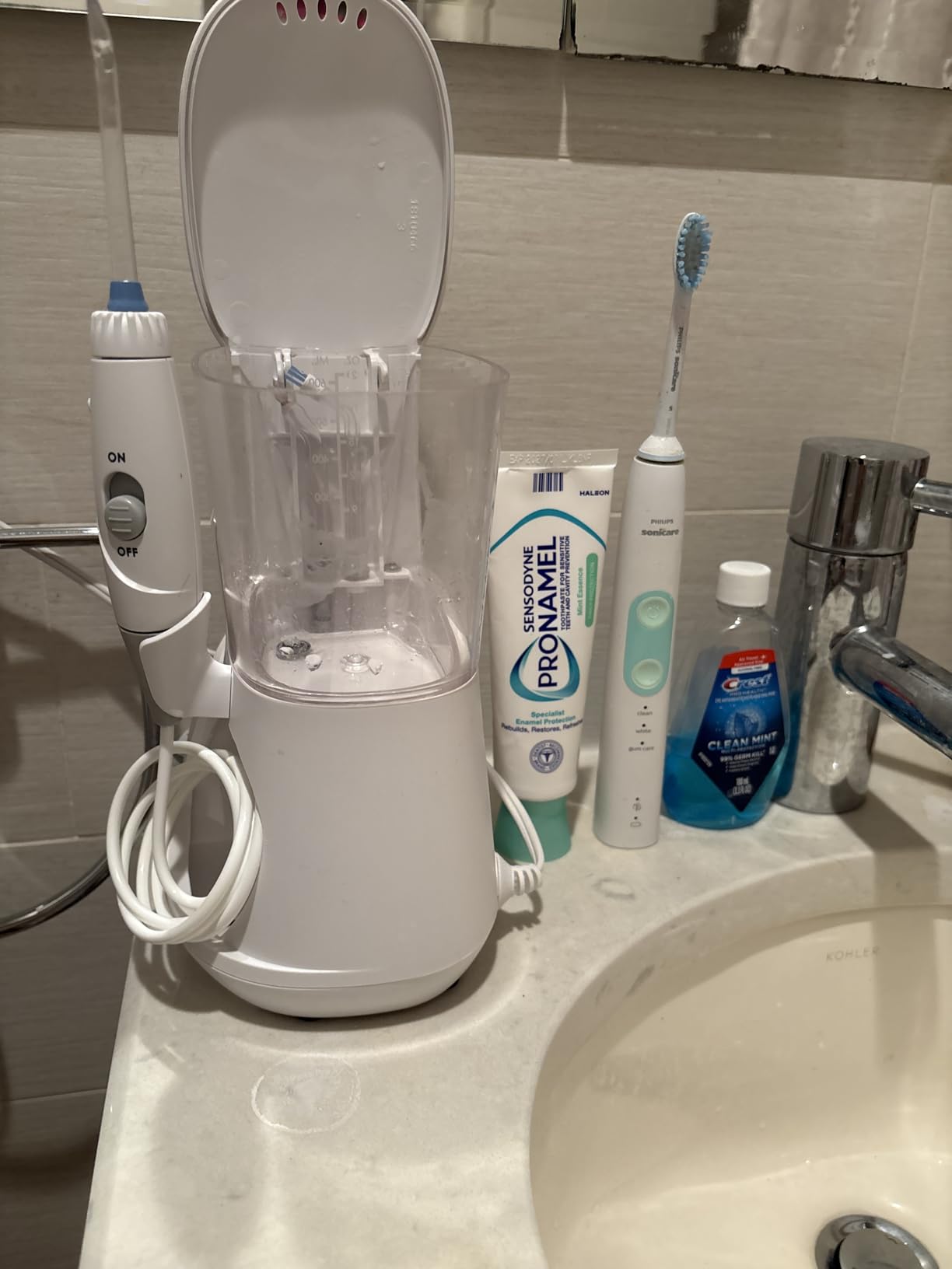 Waterpik Aquarius Water Flosser For Teeth Cleaning, Gums, Braces, Dental Care, Electric Power With 10 Settings, 7 Tips For Multiple Users And Needs, ADA Accepted, White WP-660, Packaging May Vary customer photo 1