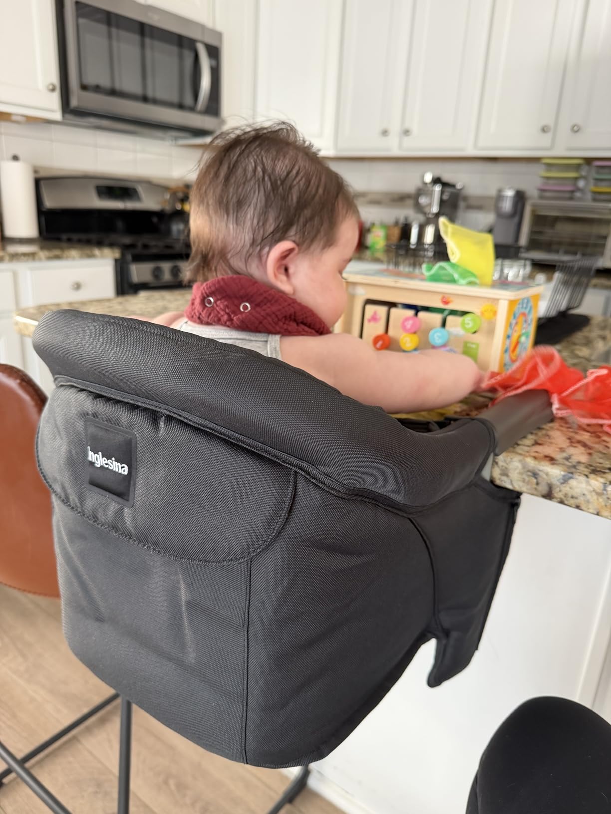 Inglesina Fast Table Chair, Black - Portable Baby High Chair - for Babies & Toddlers up to 37 lbs - Collapsible Design - Fits Tables 0.8'' to 3.5'' Thick - Compact & Easy to Use - Travel Bag Included customer photo 1