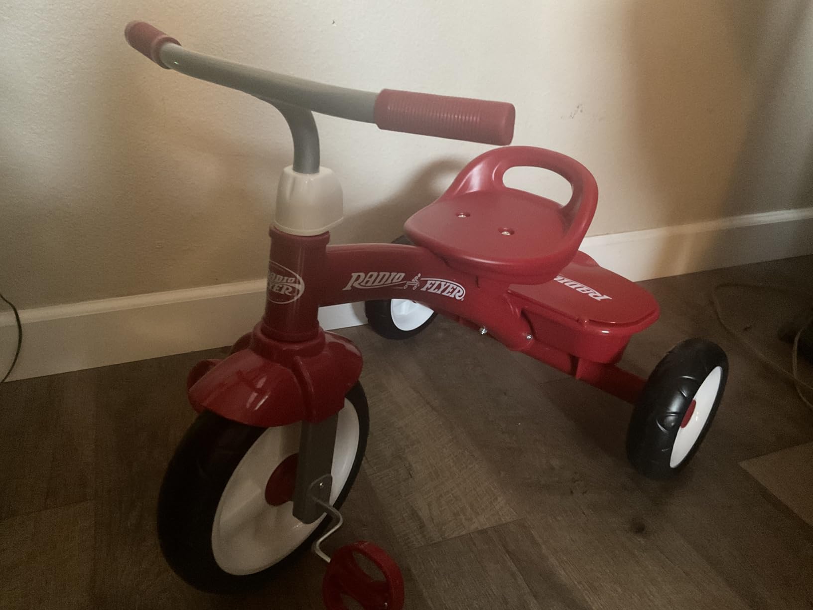 Radio Flyer Red Rider Trike, Ages 2.5-5, Adjustable Seat, Steel Construction, Quiet Ride Wheels, Storage Bin, Comfort Grip Handlebars, Tricycle for Toddlers, Amazon Exclusive customer photo 1