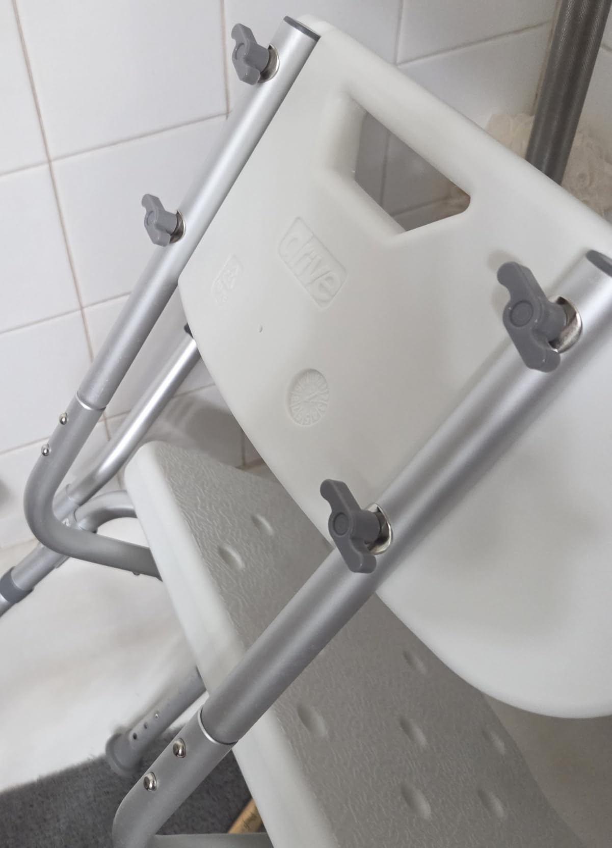 Drive Medical Shower Chair with Back & Padded Arms - Adjustable Height Bath Seat for Safety & Comfort - Lightweight Aluminum Construction- 350 Lb Capacity - White customer photo 1