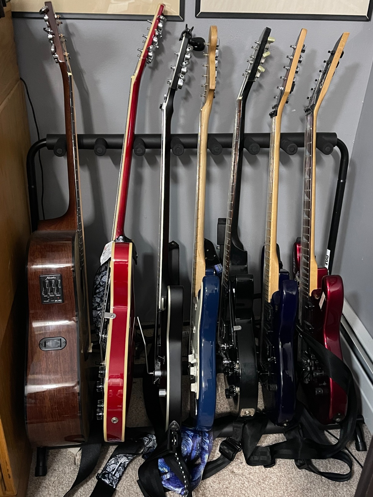 Pyle 7 Slot Multi-Guitar Stand - Universal Guitar Floor Rack for Electric, Acoustic, Bass Guitars, Ukuleles & Cases - Portable, and Protective with No-Slip Non-Scratch Padding - Black display rack customer photo 2