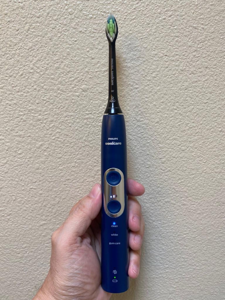 Philips ProtectiveClean 6100 Rechargeable Electric Toothbrush, Pressure Sensor, 3 Cleaning Modes, SmarTimer, QuadPacer, 14-Day Battery, Travel Case, White, HX6877/21 customer photo 1