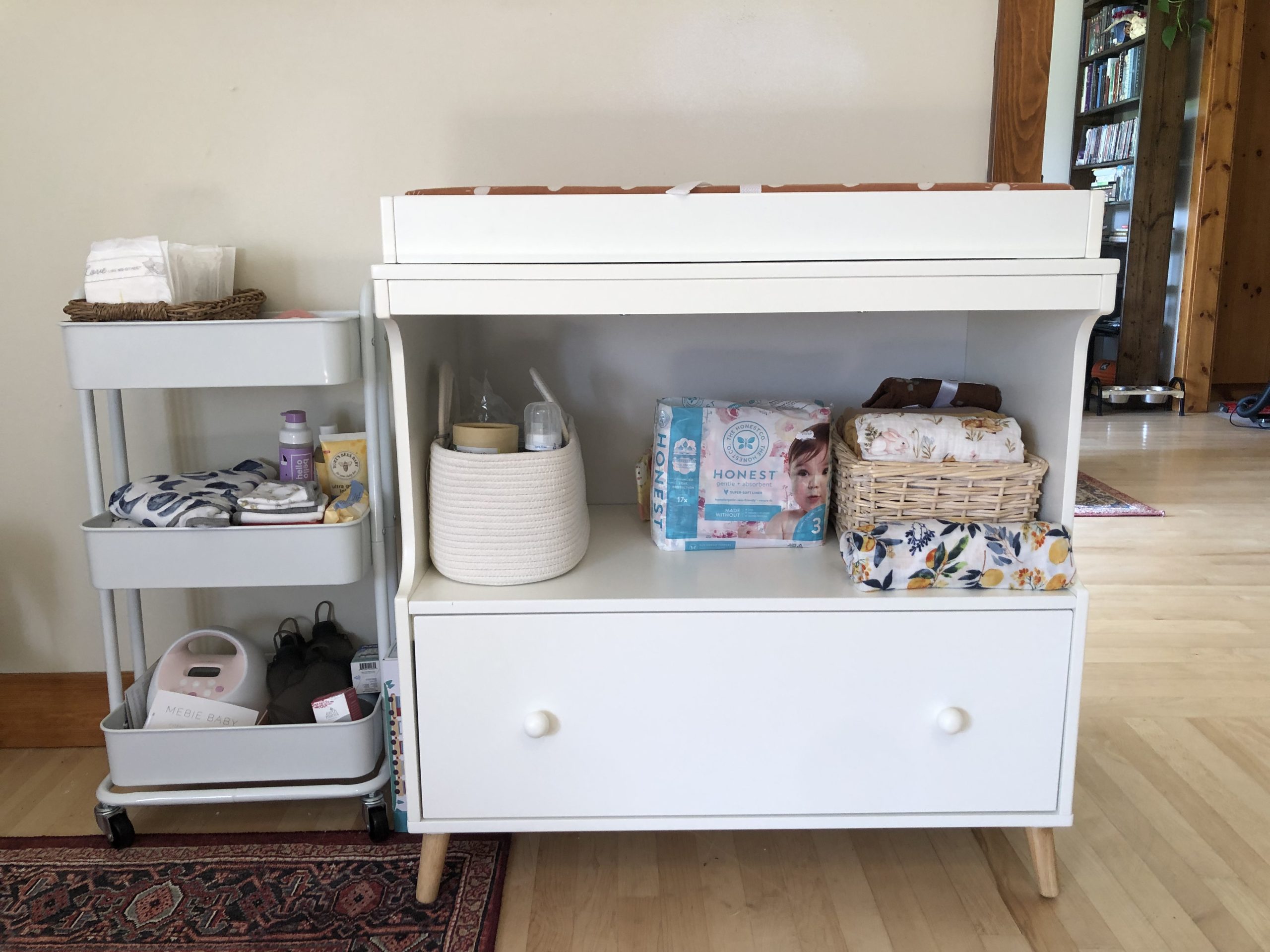 Delta Children Essex Convertible Changing Table with Drawer, Bianca White/Natural customer photo 2