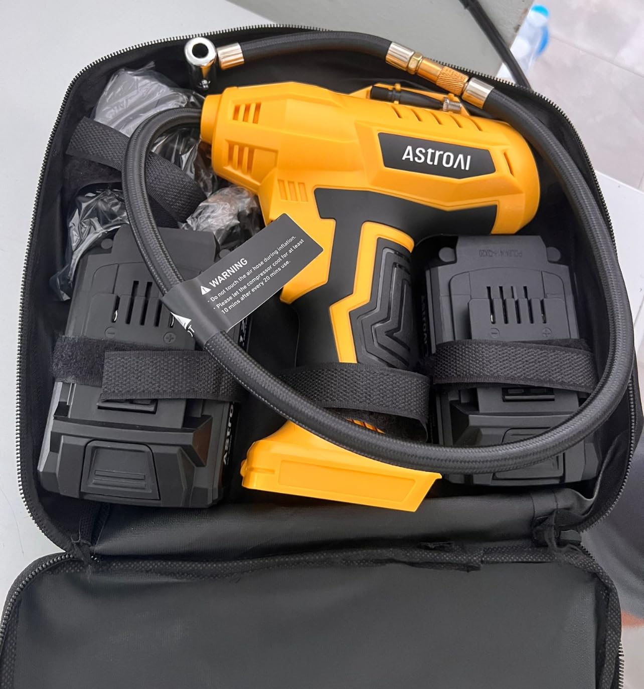 AstroAI Cordless Tire Inflator Air Compressor 20V Rechargeable Battery Powered 160PSI Portable Air Pump with 12V Car Power Adapter Digital Pressure Gauge for Cars Motorcycles JY16P160-18(C2)Yellow customer photo 1