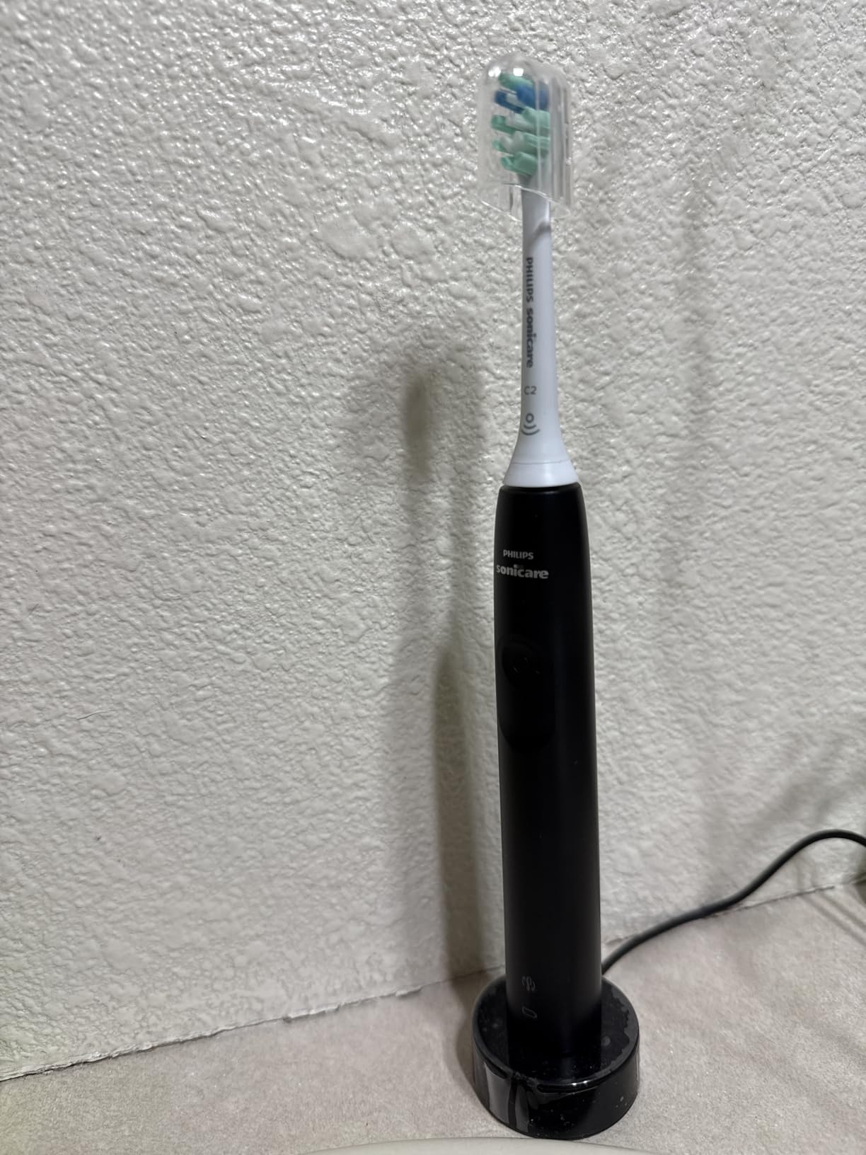 Philips Sonicare 4100 Series Electric Toothbrush, Advanced Sonic Technology, Pressure Sensor, Two Intensity Settings, Smartimer, Quadpacer, Black, HX3681/24 customer photo 1