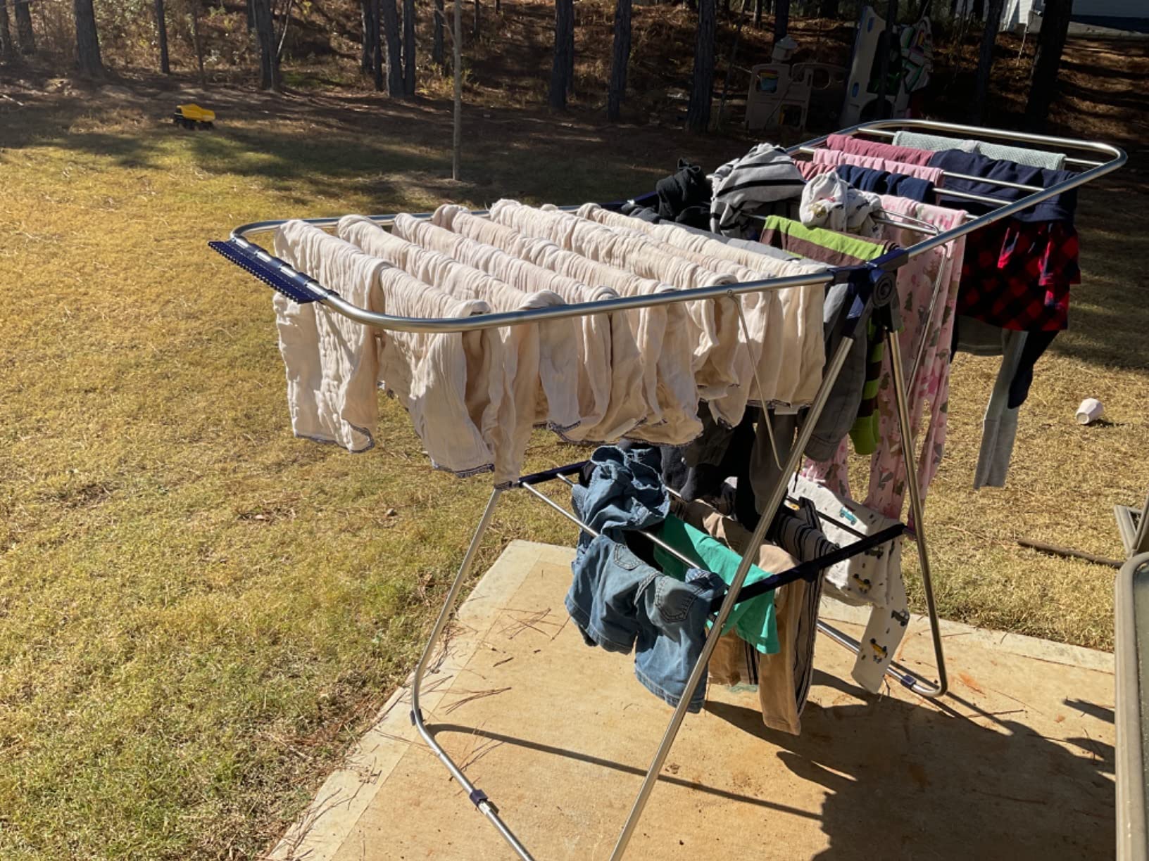 SONGMICS Clothes Drying Rack, with Sock Clips, Metal Laundry Rack, Foldable, Space-Saving, Free-Standing Airer, with 2 Height-Adjustable Gullwings, Indoor Outdoor Use, Silver and White ULLR052W01 customer photo 2