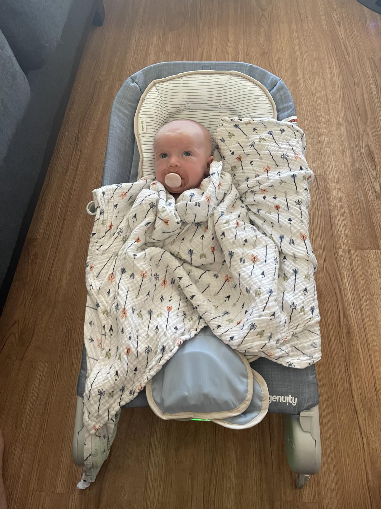Ingenuity Gas Relief and Anti-Colic Baby Bouncer Seat and Rocker, Gentle Belly Massage to Relax and Soothe Bellies, Instant Tummy Soother, 20 Songs and Melodies - Chambray Blue customer photo 1
