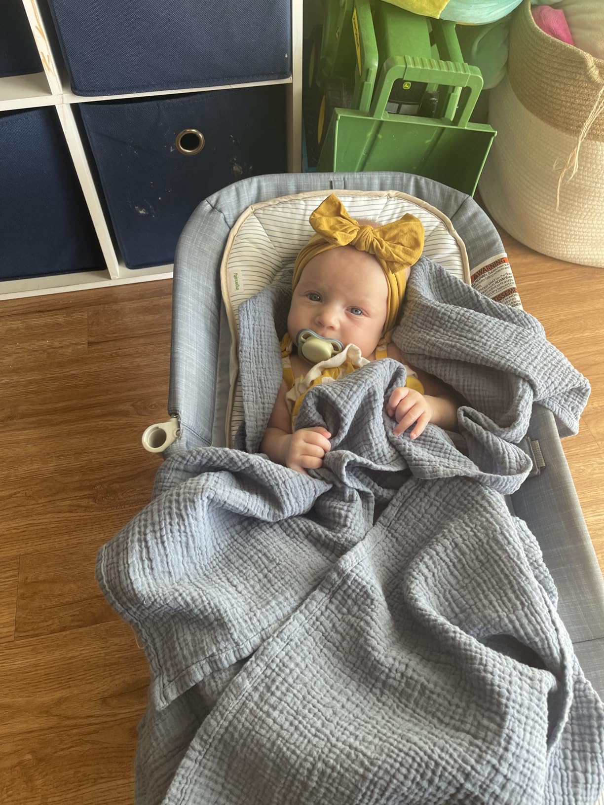 Ingenuity Gas Relief and Anti-Colic Baby Bouncer Seat and Rocker, Gentle Belly Massage to Relax and Soothe Bellies, Instant Tummy Soother, 20 Songs and Melodies - Chambray Blue customer photo 2