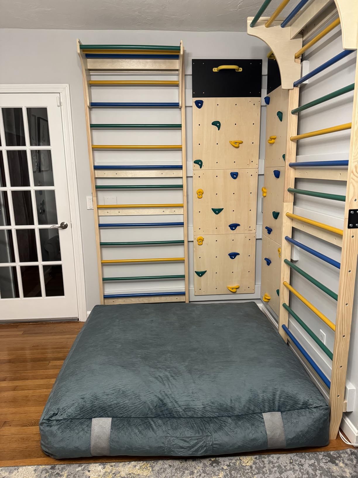 ComfyBumpy Rock Climbing Wall for Kids | Indoor Playground Play Gym Set with Drawing Blackboard and 12 Non-Slip Holds | Durable Wooden Climber for Ages 3+ customer photo 1