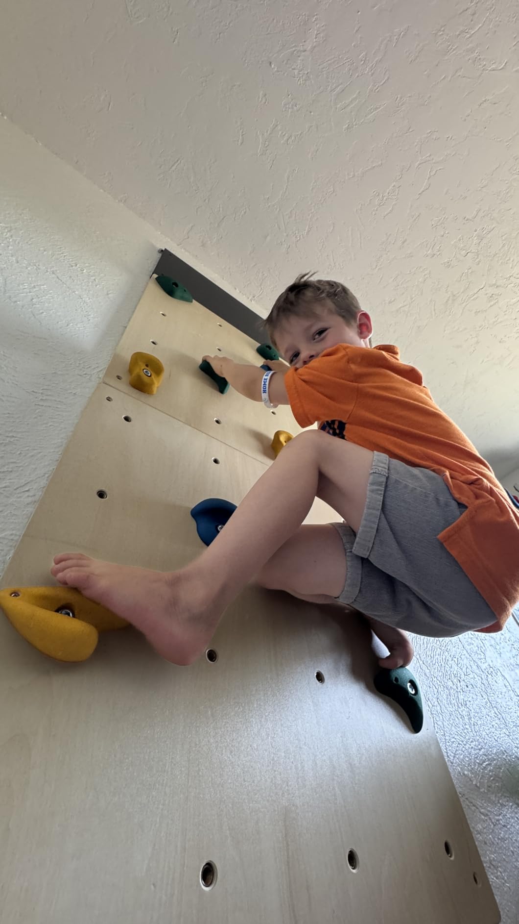 ComfyBumpy Rock Climbing Wall for Kids | Indoor Playground Play Gym Set with Drawing Blackboard and 12 Non-Slip Holds | Durable Wooden Climber for Ages 3+ customer photo 2