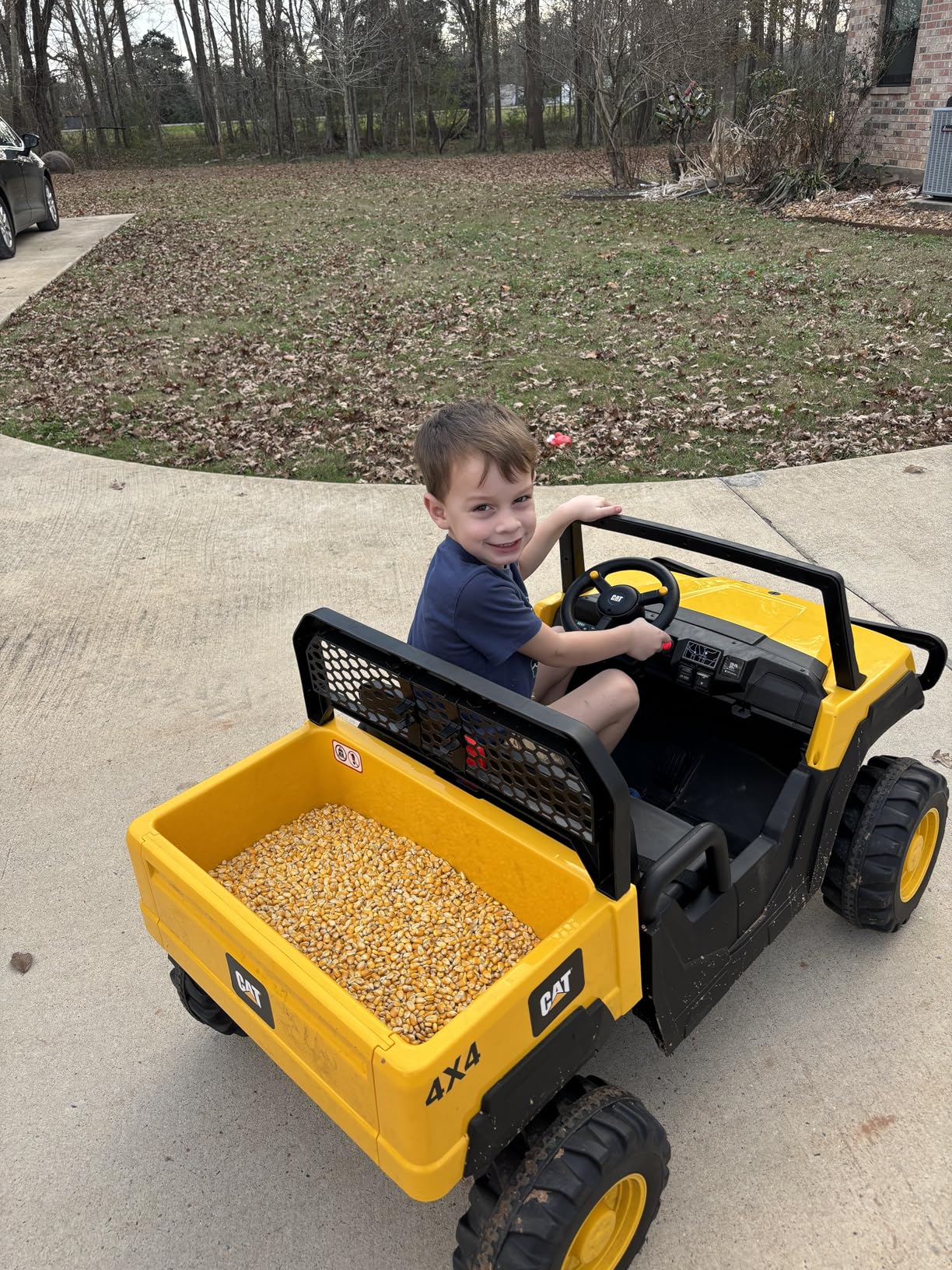 ANPABO 2 Seater Licensed Caterpillar Ride On Dump Truck, 24V Ride On Toys with 4x100W Motors, Up to 5Mph, Parent Remote, Shock Absorbers, Dump Bed and Shovel, Electric Car for Kids customer photo 1
