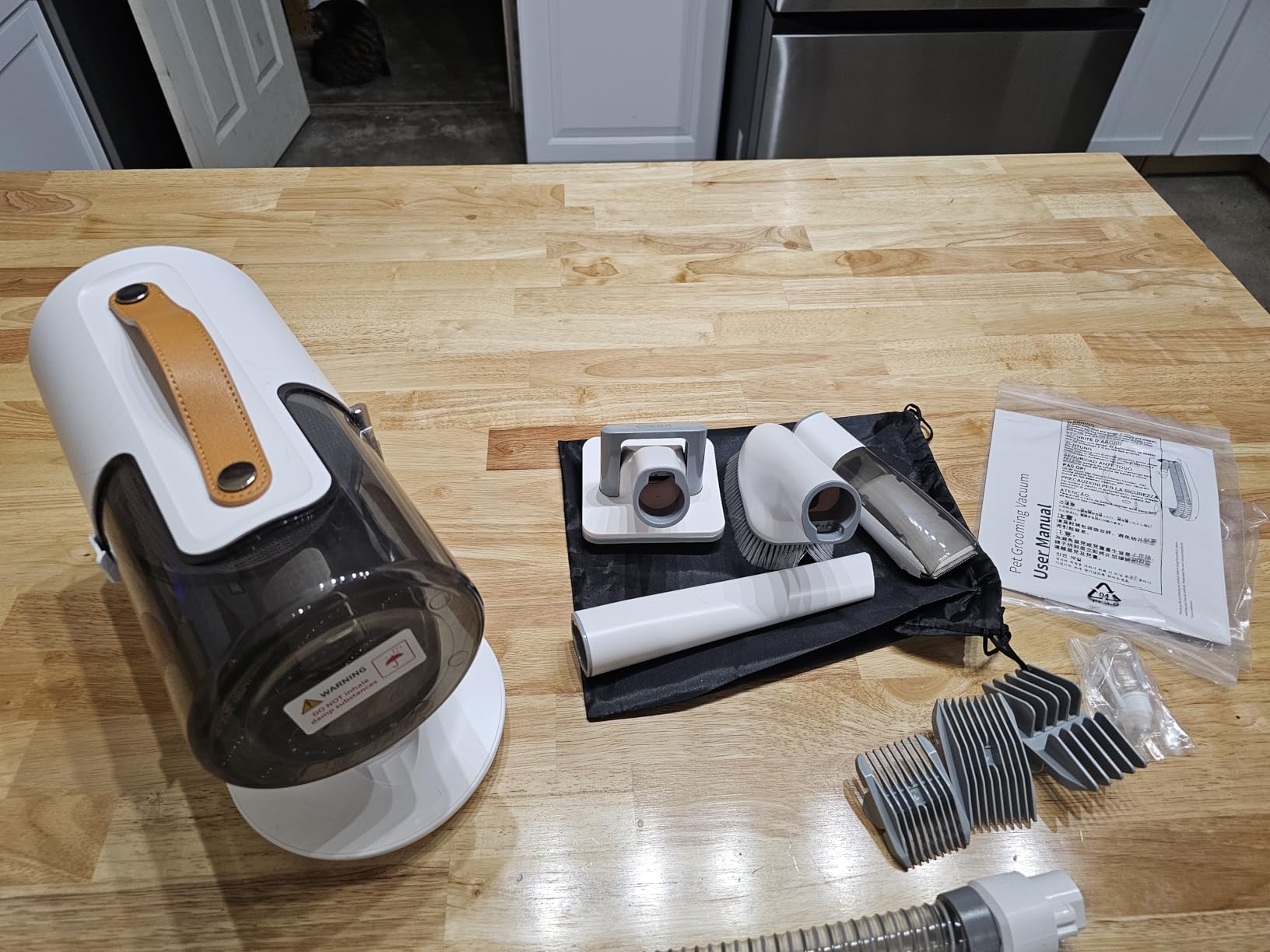 AIRROBO Dog Grooming Vacuum and Kit with Clipper Nail Trimmer Grinder, 12000Pa Pet Vacuum for Shedding Grooming, 2L Large Capacity Dog Hair Vacuum with 8 Pet Grooming Tools, PG100 Plus customer photo 2