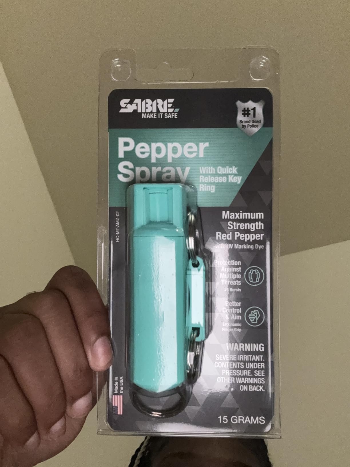 SABRE Pepper Spray with Quick Release Keychain for Self Defense - Maximum Police Strength OC Spray with UV Marking Dye, Twist Lock Safety, Finger Grip, 10-Second Spray, 14-ft Range, Made in USA customer photo 2