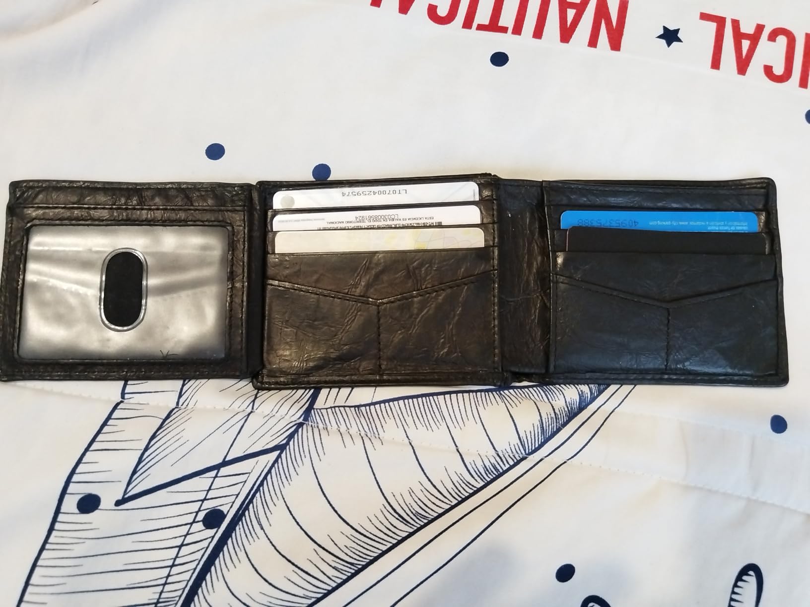 Fossil Men's Quinn Leather Bifold with Flip ID Wallet, Men's Leather Wallet, Black customer photo 2