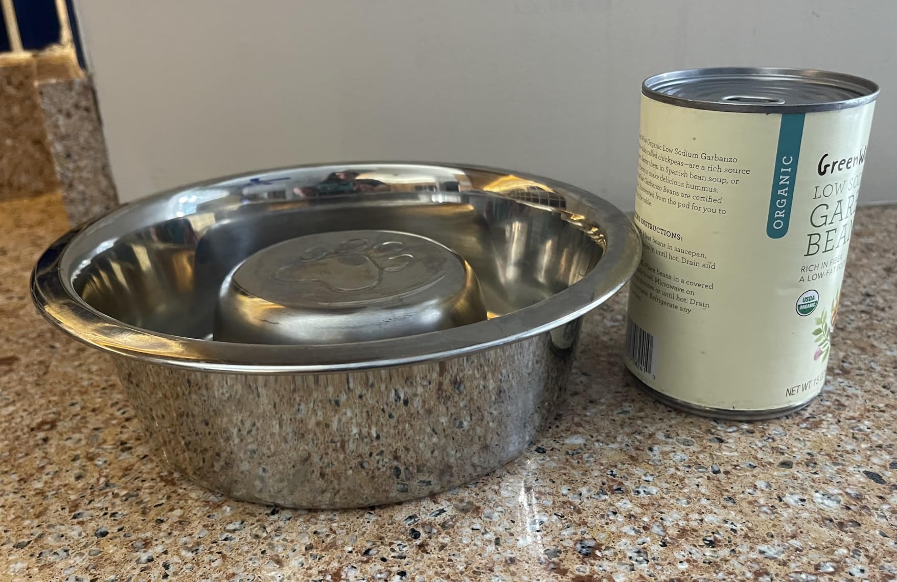 Neater Pet Brands Stainless Steel Slow Feed Dog Bowl for Fast Eating Large Breed, Metal Slow Feeder Dog Bowl Fits in Large Neater Feeders, for Puppy or Dogs (>40 lbs), 3 Cup Food Capacity customer photo 2″ class=”wp-image-customer”/></figure>


<h3>Compatibility with elevated feeders</h3>
<p>This bowl fits inside Neater Feeder Deluxe Large and Neater Feeder Express Medium to Large models. It also fits any elevated feeder with a bowl opening between 7.25 and 8 inches. If you use an elevated feeding setup, measure your bowl opening before ordering to confirm compatibility.</p>
<h3>Capacity trade-off</h3>
<p>The raised center means this bowl holds about 40% less food than a standard bowl of the same diameter. The 3-cup capacity is the maximum, so plan accordingly if your dog eats large portions. Some reviewers manage this by feeding two smaller meals instead of one large one.</p>
<div class=