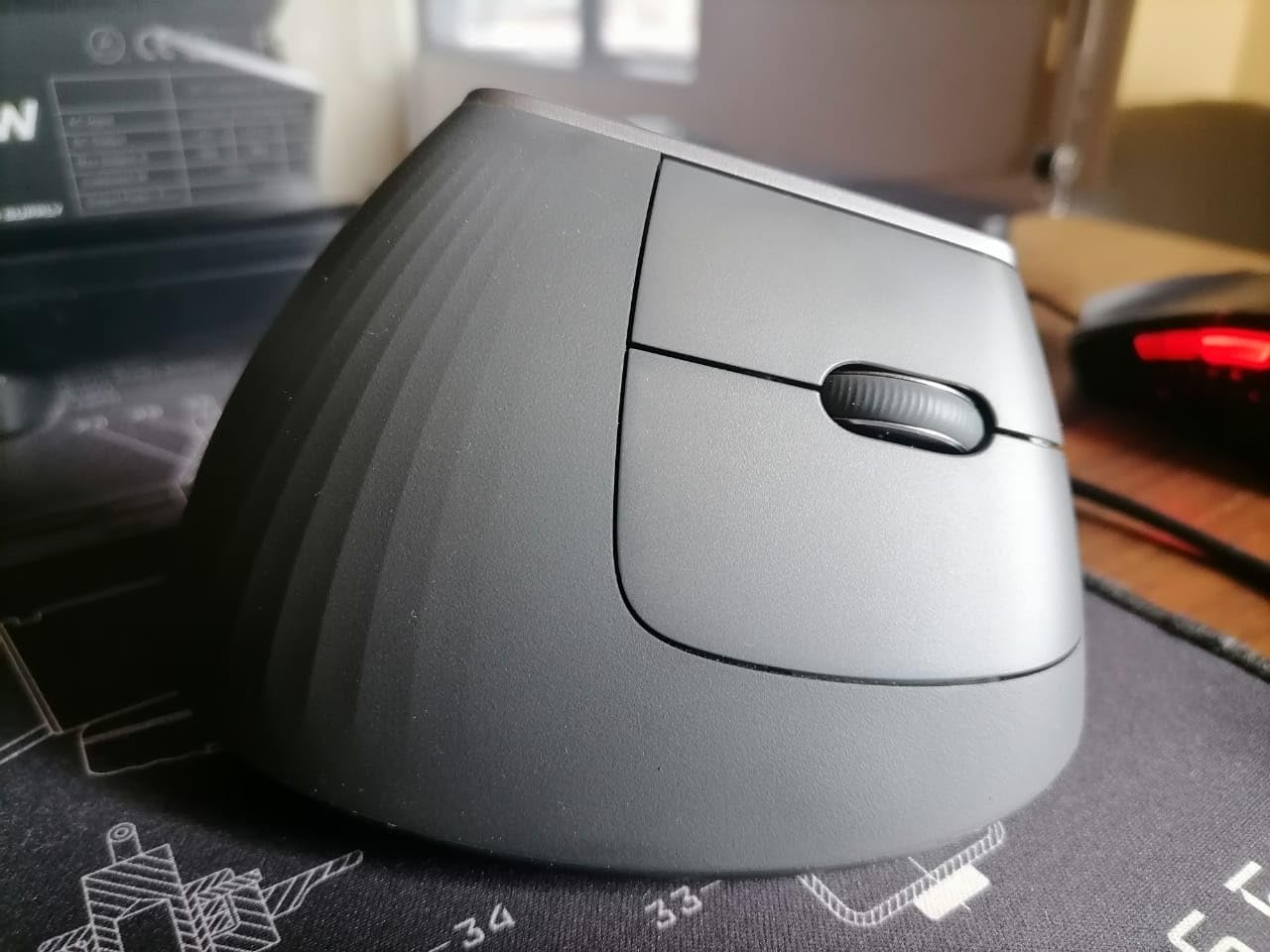 Logitech MX Vertical Wireless Mouse - Ergonomic Design Reduces Muscle Strain, Move Content Between 3 Windows and Apple Computers, Rechargeable, Graphite customer photo 2
