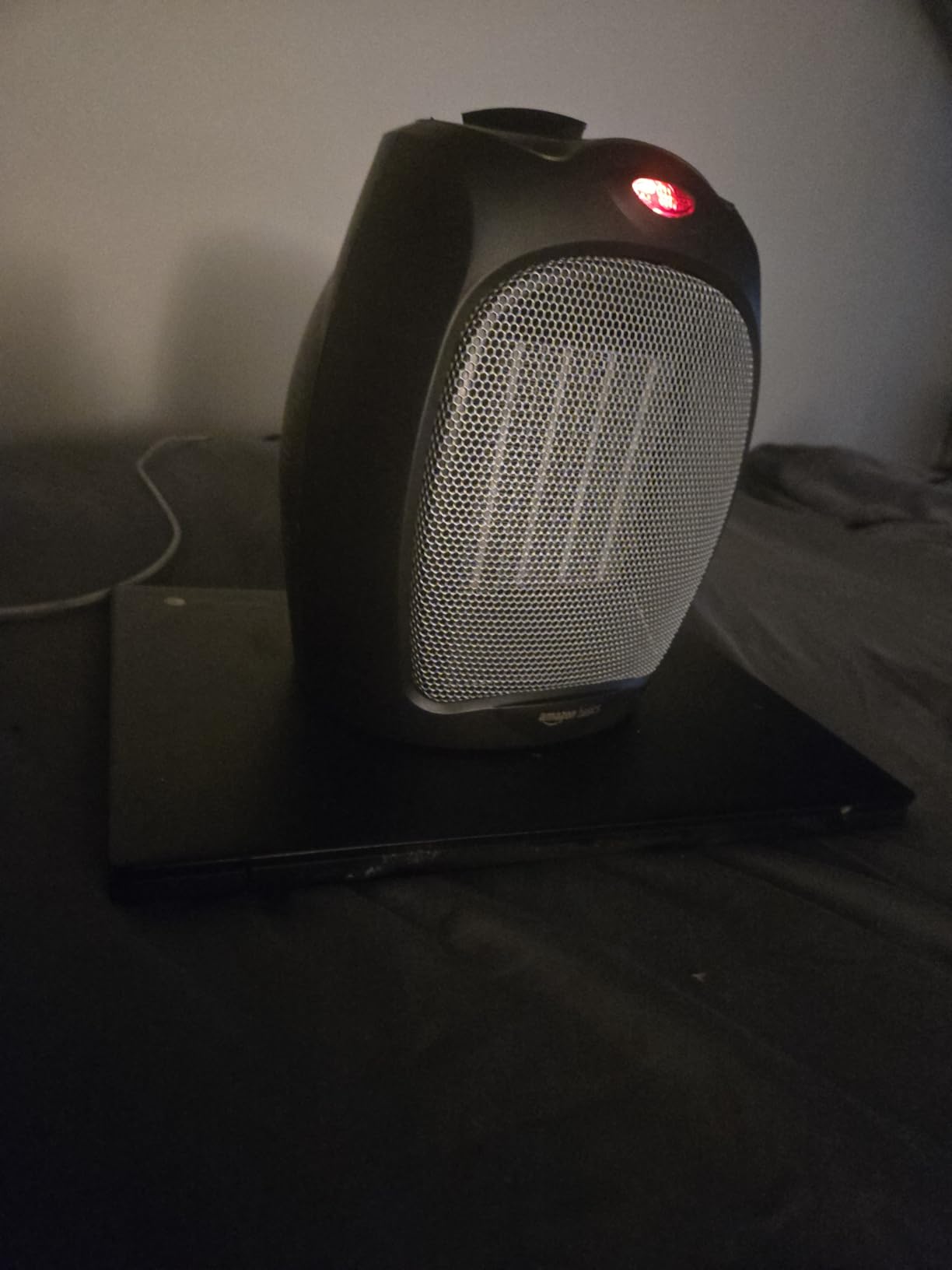Amazon Basics Ceramic Space Heater, Portable Indoor Heating Solution, With Overheat and Tip-Over Protection, Thermostat, Non-Oscillating, 1500W, Fast Heating, Silver customer photo 2