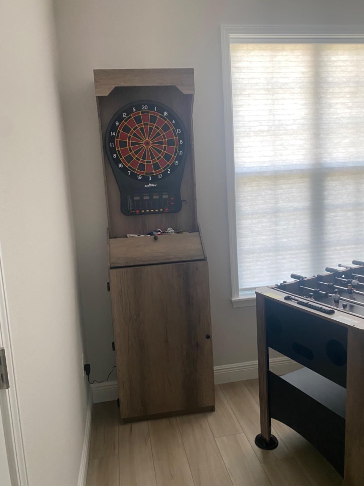Arachnid Rustic Wood Cabinet: Freestanding LED Unit with E650 Electronic Board. Features 33 Games, 303 Variations, and 8-Player Scoring. Includes 6 Darts and Accessories for a Complete Setup. customer photo 1