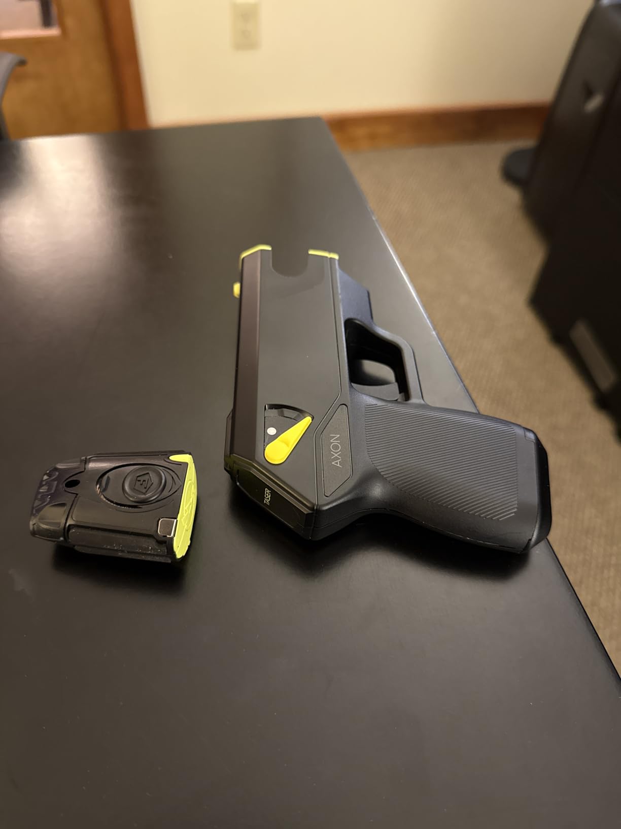TASER Pulse 2 Self-Defense Device with Painful 63 uC Stun Charge, Compact 8oz Full Muscle Lock-Up with 2 Cartridges with 15 Foot Range, Rugged Carry Case, Battery, Practice Target, Protective Sleeve customer photo 1