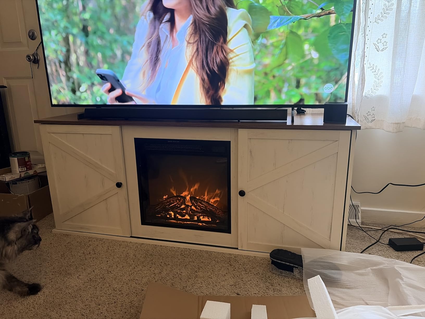 VASAGLE Farmhouse TV Stand for TVs up to 65 Inches, Entertainment Center with Storage Cabinets and Sliding Barn Doors, Media Console Table for Living Room, Rustic White and Honey Brown ULTV535W01 customer photo 1