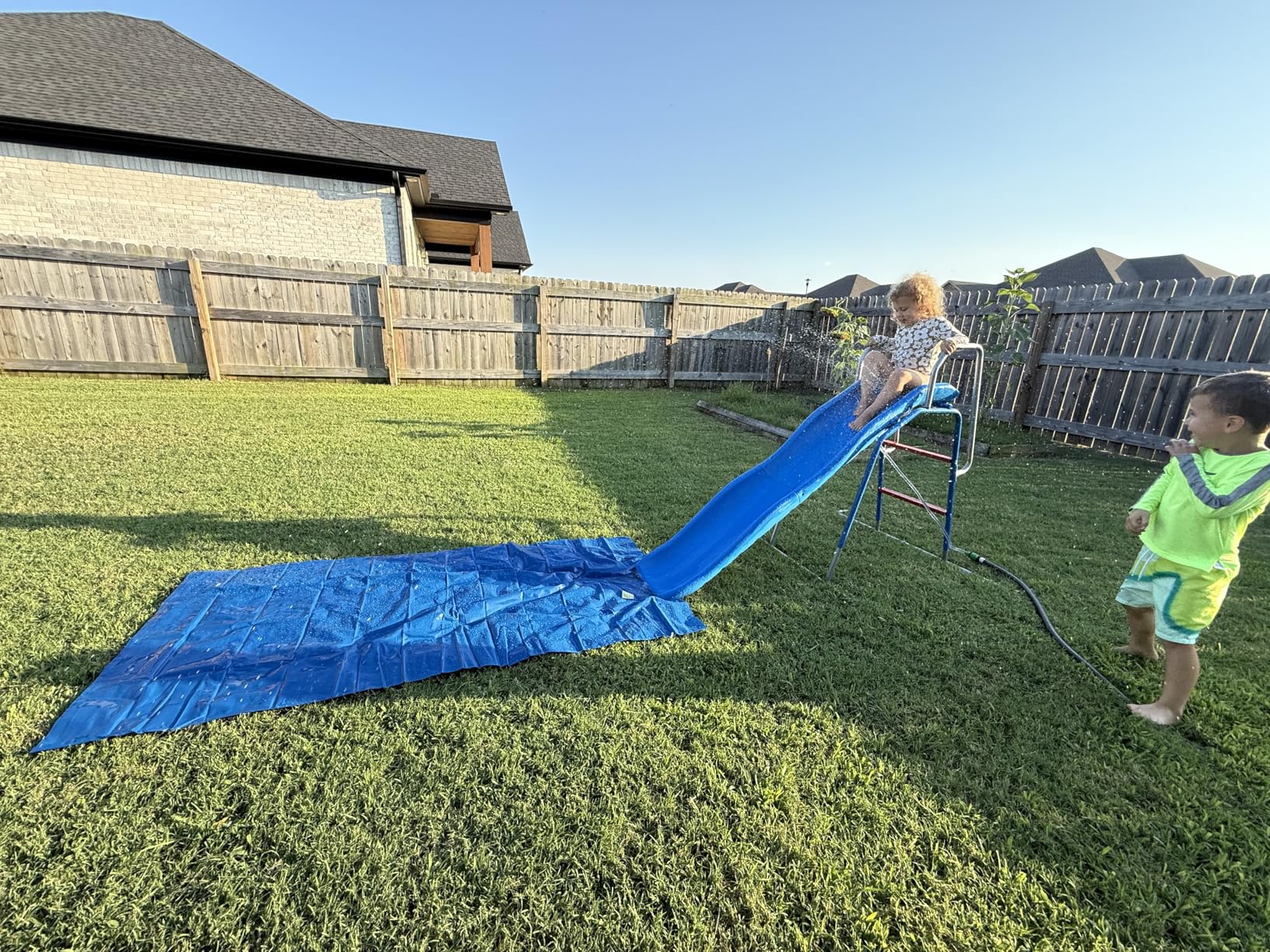 OHYEMO Water Slide for Kids Backyard, Outdoor Waterslide with 3-Zone Spray Sprinkler and Ground Tarp, Summer Water Game Toy customer photo 2