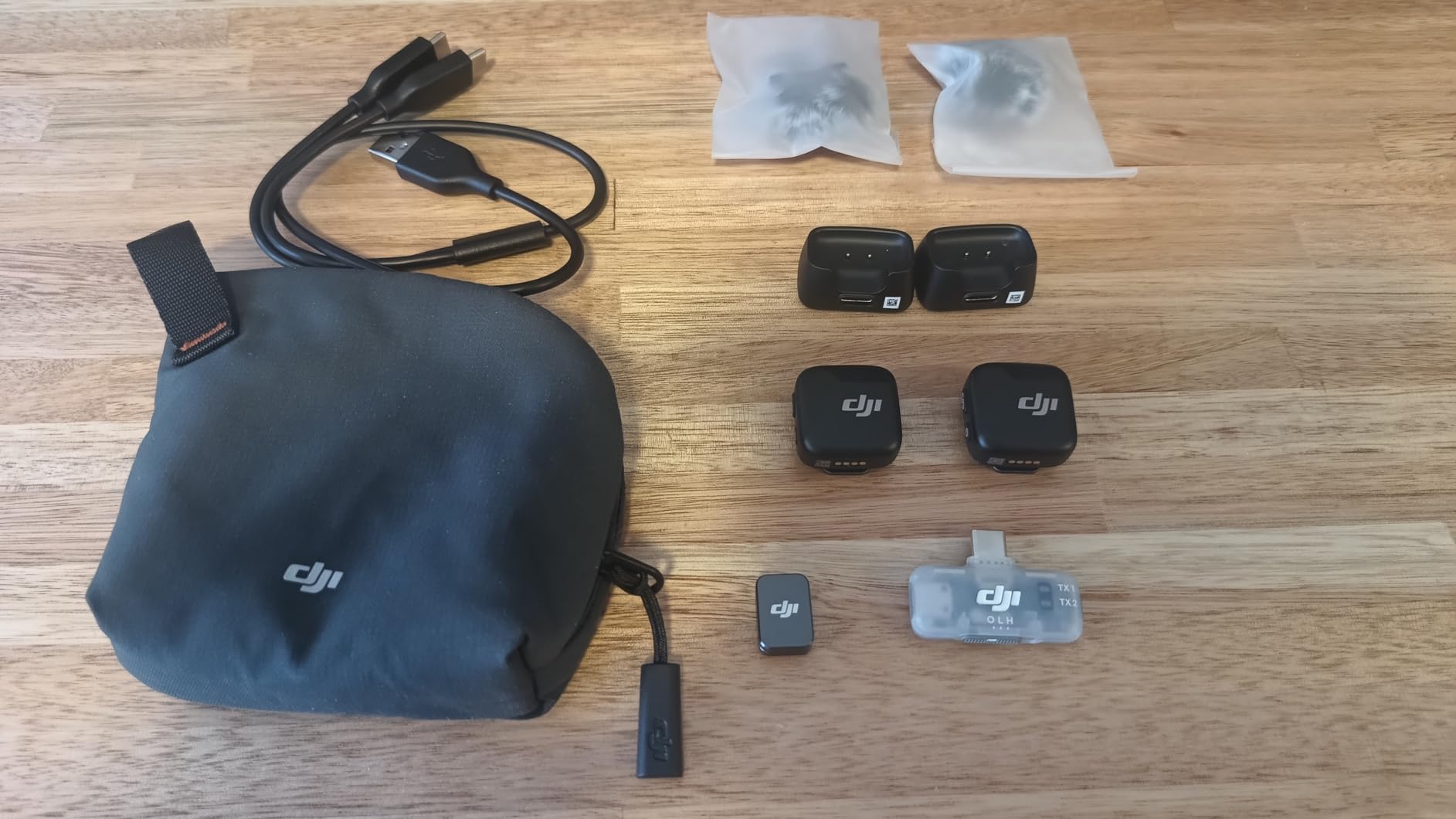 DJI Mic Mini (2 TX + 1 Mobile RX), Wireless Lavalier Microphone for iPhone 17/16/15 & Android/PC/Tablet, Plug-and-Play, 300m Transmission, Ultralight, Active Noise Cancelling, YouTube, Vlog, Streaming customer photo 1
