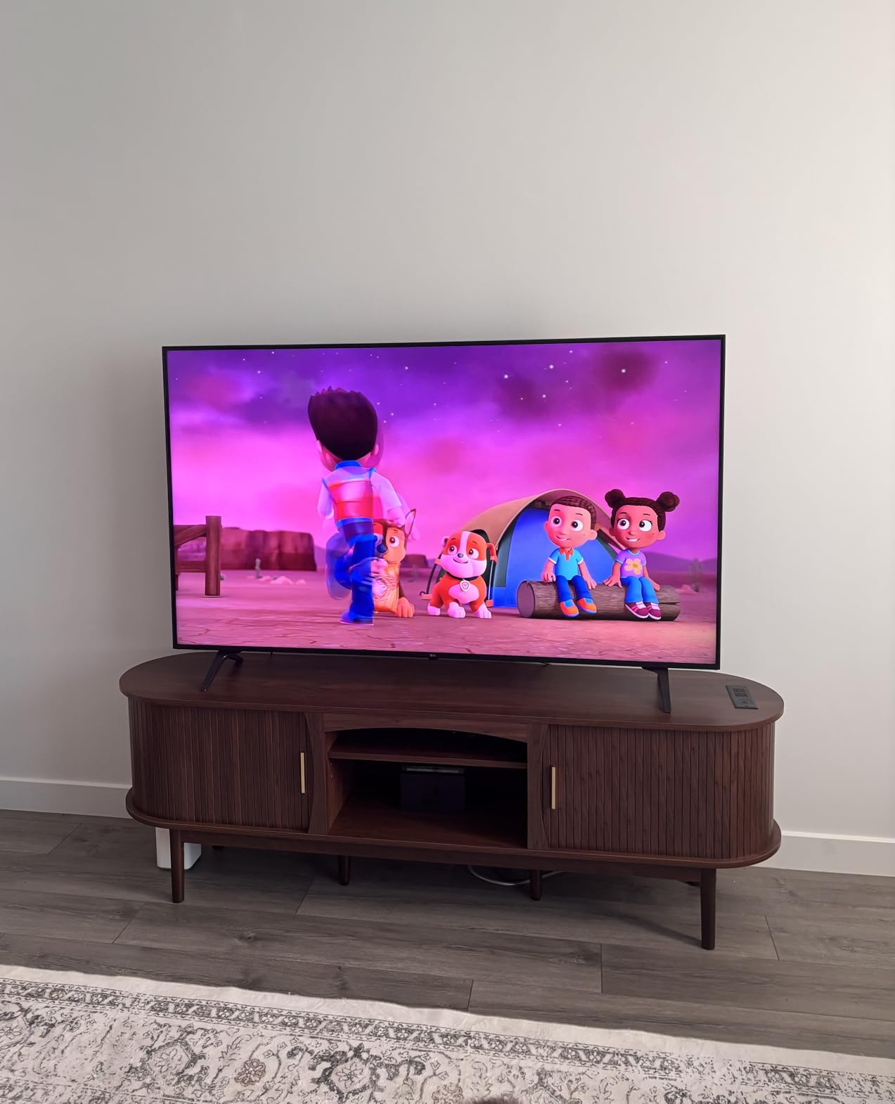 Decofy Mid Century TV Stand for TVs up to 80 Inches, Entertainment Center with Storage, Power Outlet, Fluted Sliding Doors & Adjustable Shelves, Modern Media TV Console Table for Living Room (Walnut) customer photo 1