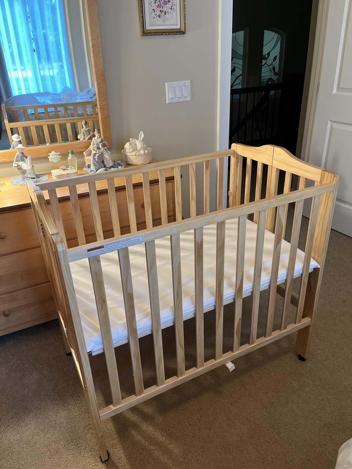 Delta Children Folding Portable Mini Baby Crib with 1.5-inch Mattress - Greenguard Gold Certified, White customer photo 1