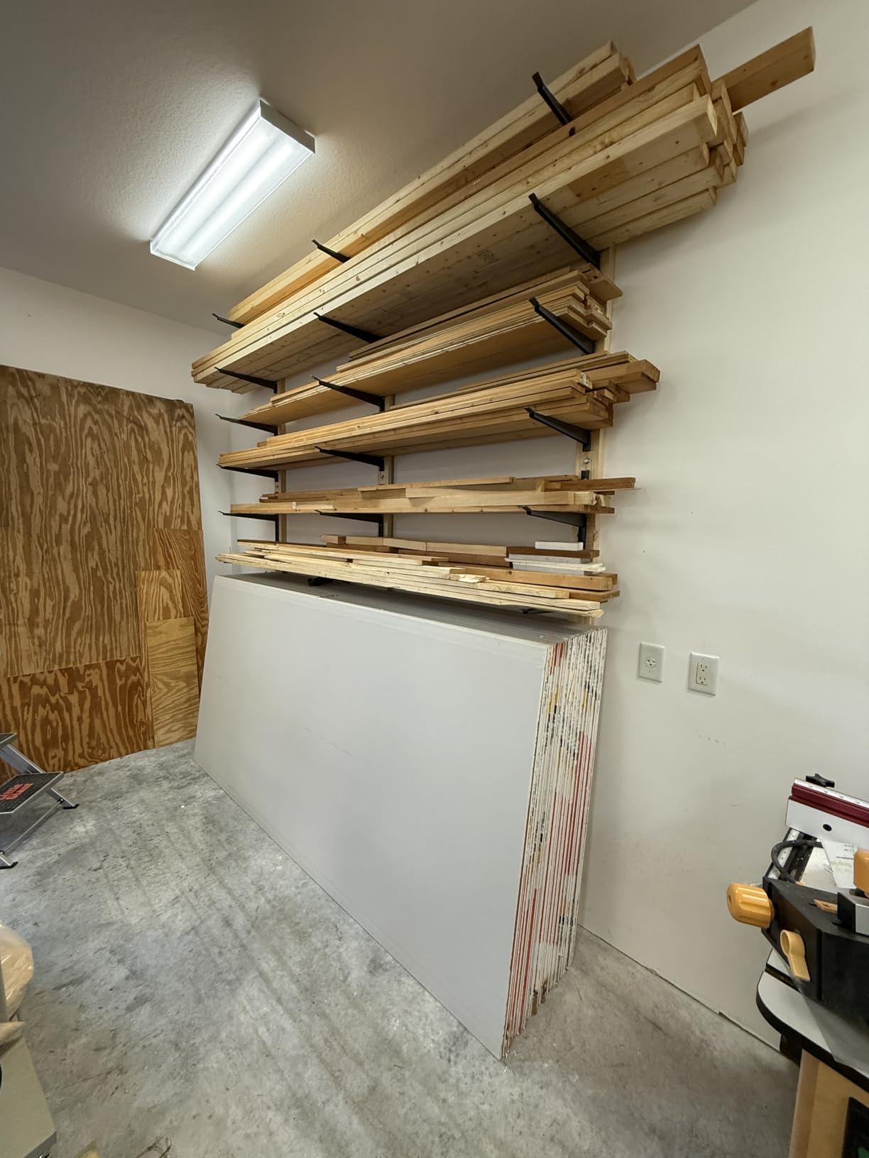 Delta Heavy Duty Lumber Storage Rack Cycle, Holds Up to 800 lbs - Easy to Install Wood Storage Rack with Fully Adjustable Arms - Steel Construction customer photo 1