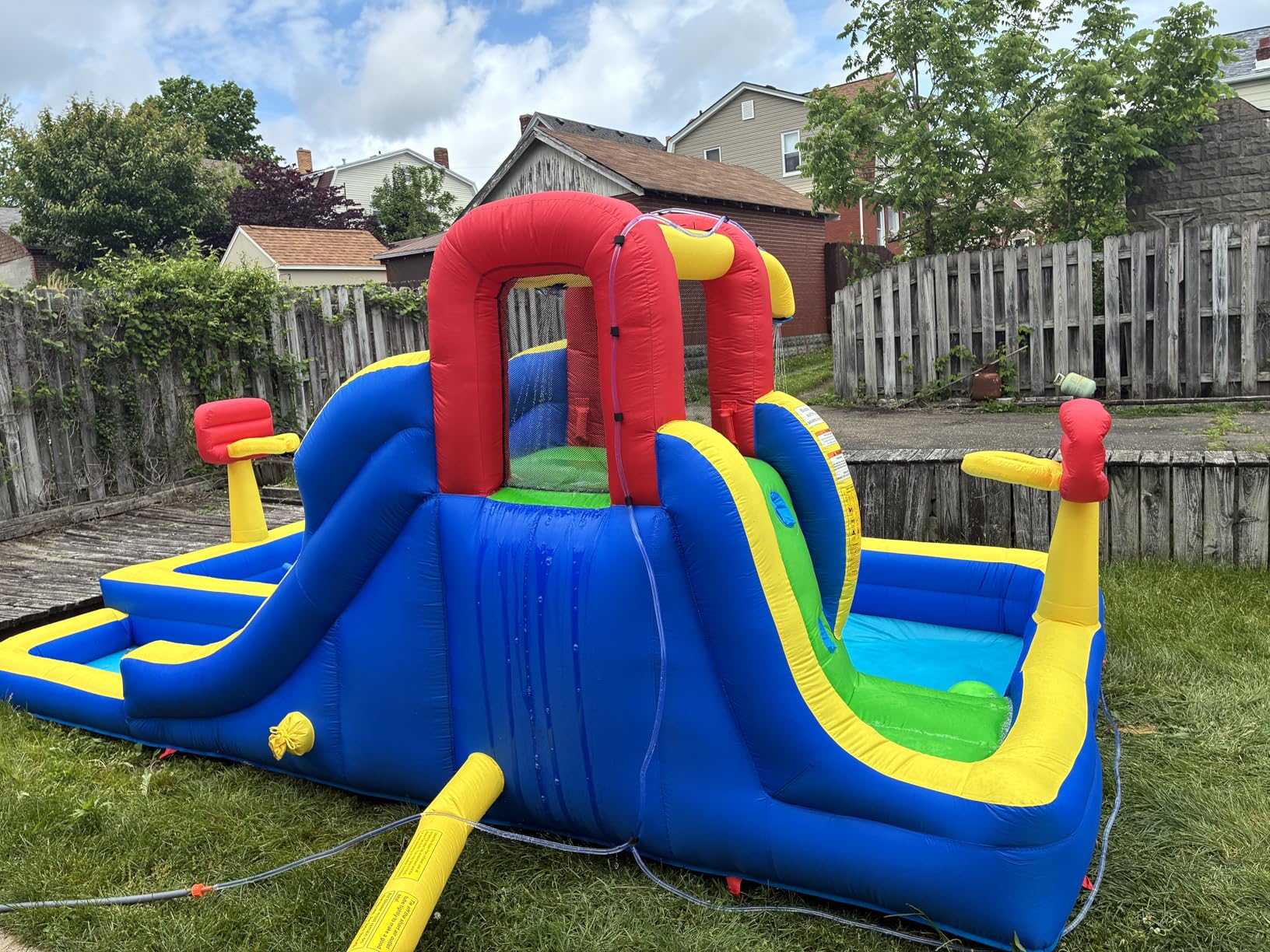 WELLFUNTIME Inflatable Water Park with Blower, Bouncy Castle with Water Cannon and Double Basketball Rings customer photo 1