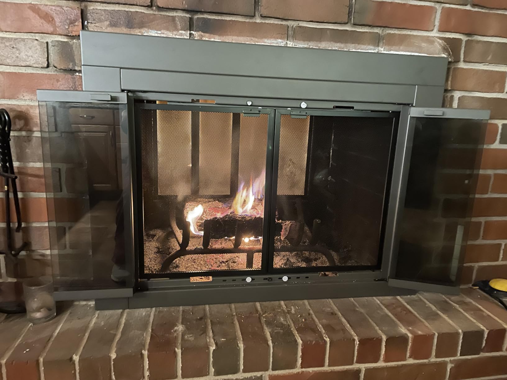 UniFlame Roman Bi-fold Style Fireplace Doors with Smoke Tempered Glass, Black, Large (Fits Opening 36in to 43in W x 25.5in to 32.5in H) customer photo 2