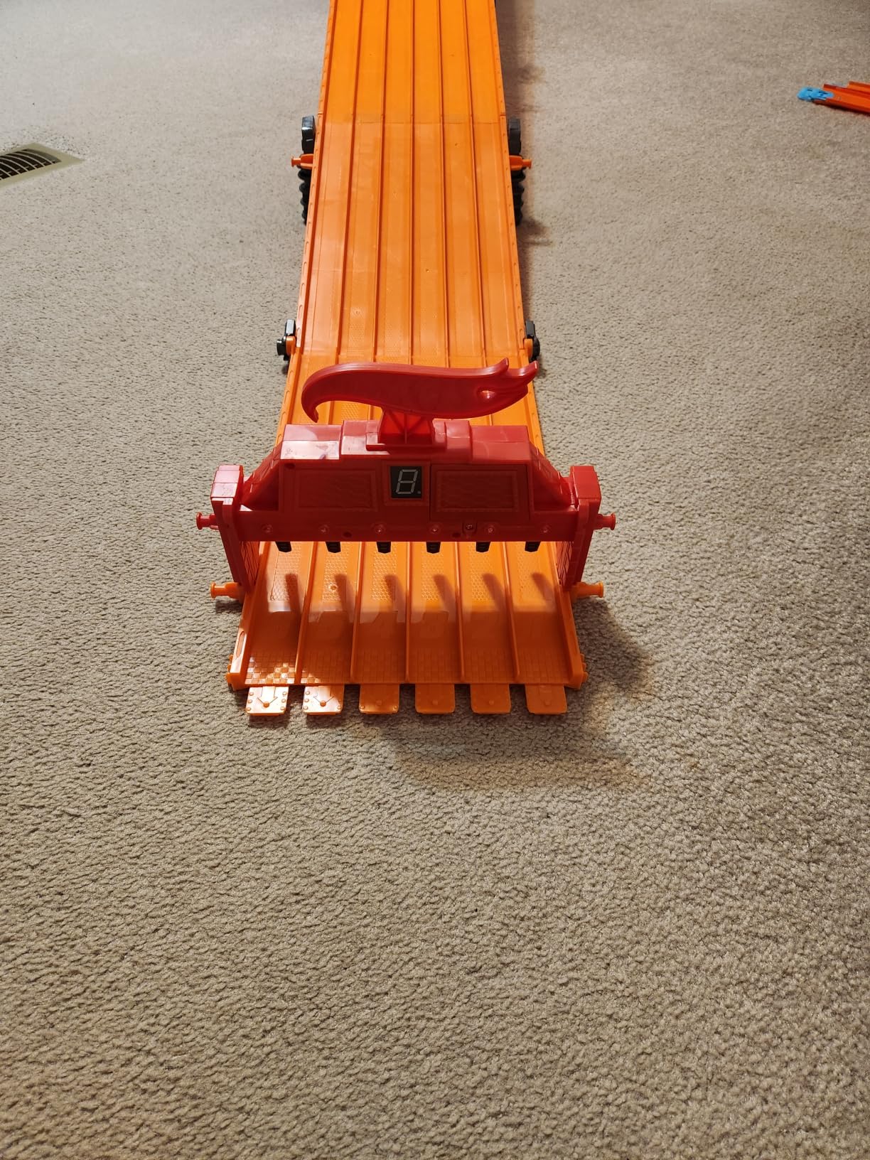 Hot Wheels Toy Car Playset with Lights, Sounds & 6 1:64 Scale Vehicles, Super 6-Lane Raceway, 8-foot Track that Rolls Up for Storage (Amazon Exclusive) customer photo 2