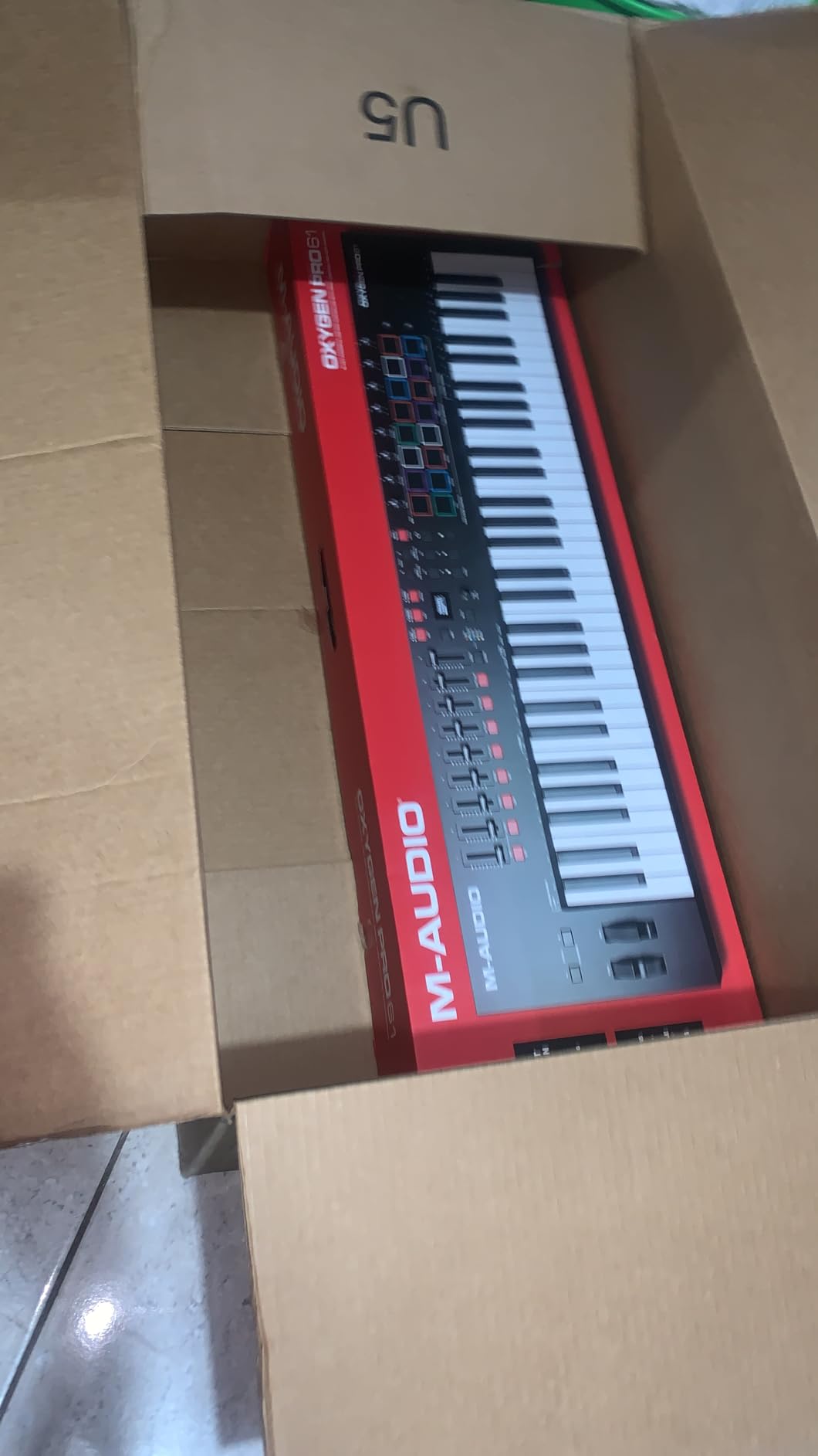 M-AUDIO Oxygen Pro 61 Key USB MIDI Keyboard Controller With Beat Pads, MIDI-assignable Knobs, Buttons and Faders, and Native Instruments Sound Package customer photo 1