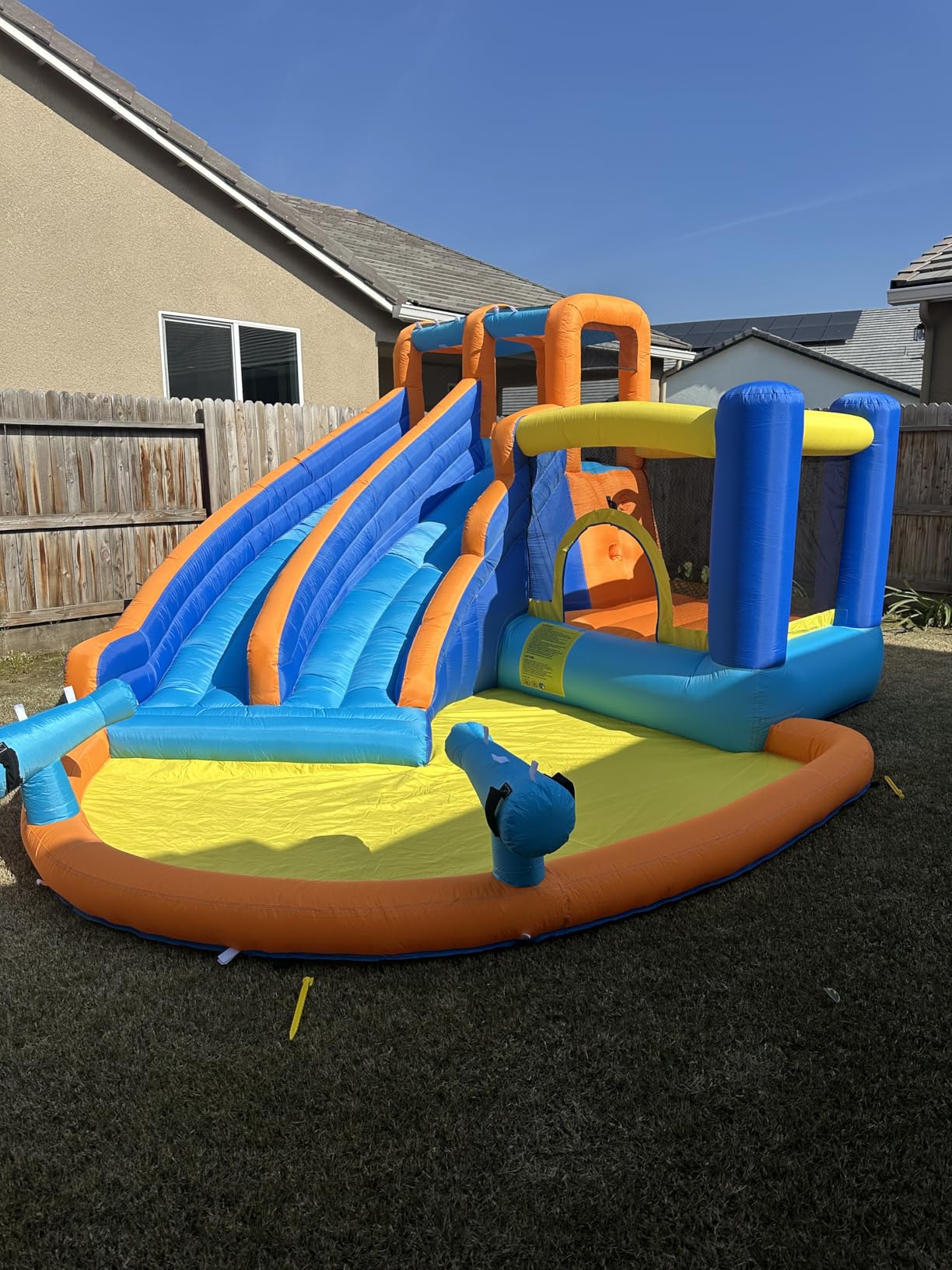 JOYLDIAS Inflatable Water Slide Bounce House, Slide Bouncer Castle Playhouse w/Splash Pool, Jump Area, Climbing Wall, Basketball Hoop, 450W Air Blower for Kids Backyard Indoor Outdoor Use, Free Water Gun customer photo 1