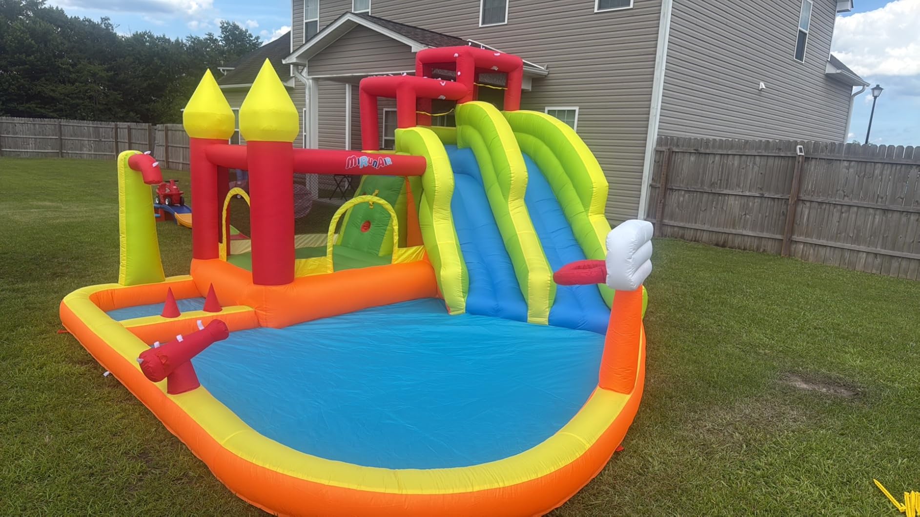 MIRUNAIR Inflatable Bounce House with Slides, Inflatable Water Slide for Kids Backyard, Bounce Water Park with Air Blower, Splash Pool, Water Cannon, Climbing Wall, Outdoor Backyard Water Park customer photo 1