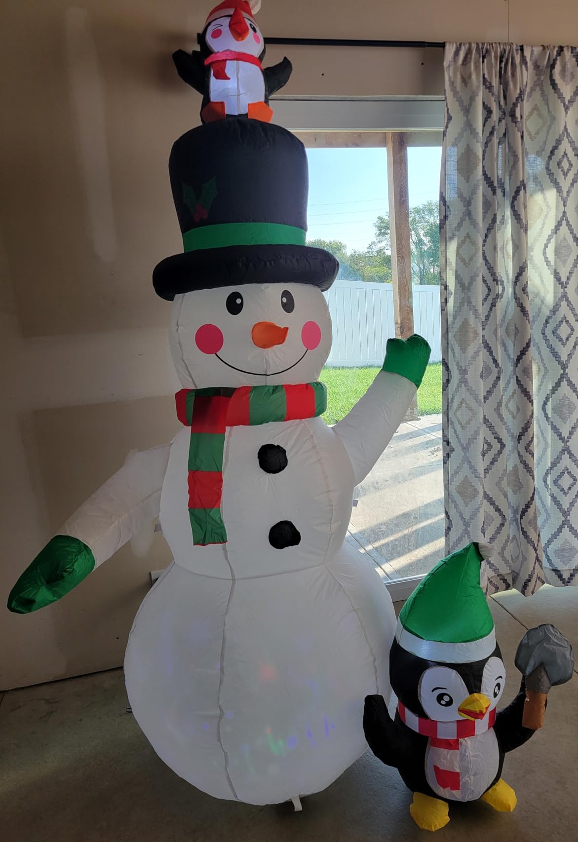 GOOSH 7 FT Christmas Inflatables Snowman and Penguin with Built-in Music & 360 Degree Rotation Colorful Projector LED Light, Blow Up Snowman Outdoor Christmas Decoration for Holiday Party Xmas New Year customer photo 1