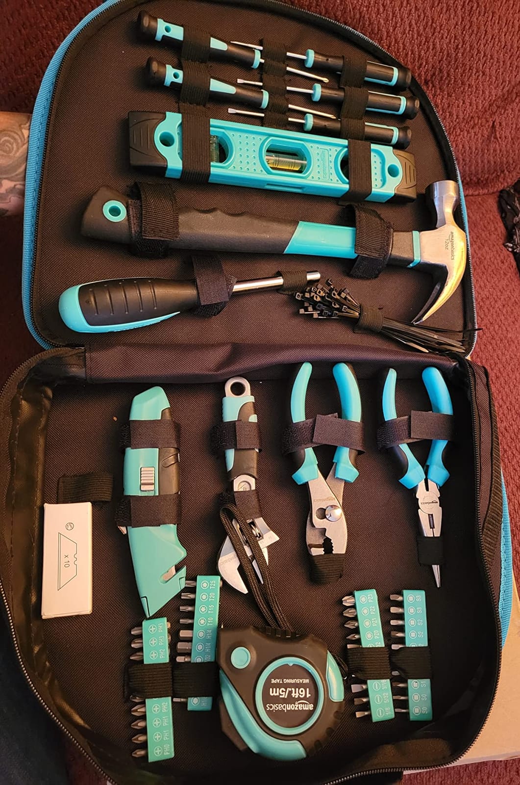 Amazon Basics 104-Piece Home Repair Household Tool Set with Easy Carrying Round Pouch, Portable Hand Tool Kit, Turquoise, 14.4 x 11.4 x 3 inches customer photo 1