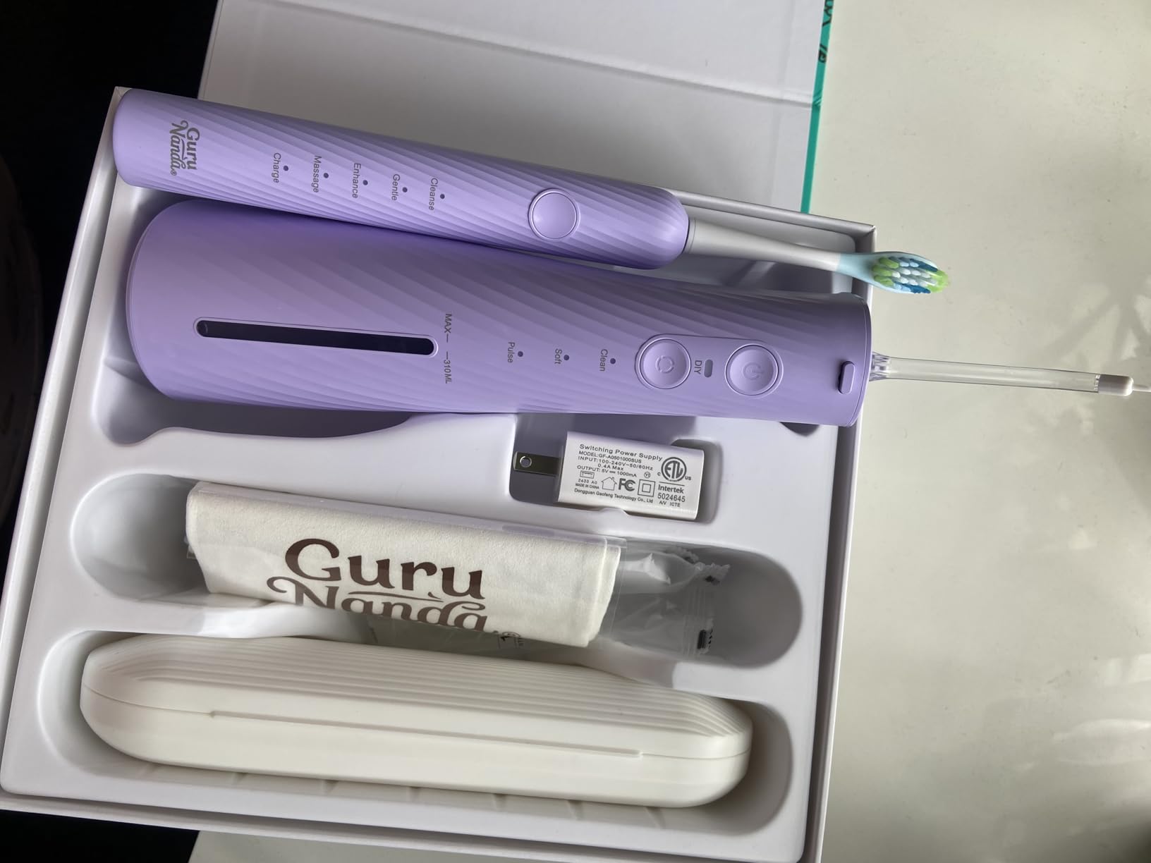 GuruNanda Electric Toothbrush & Water Flosser, 4 Toothbrush Heads, 4 Tips customer photo 1